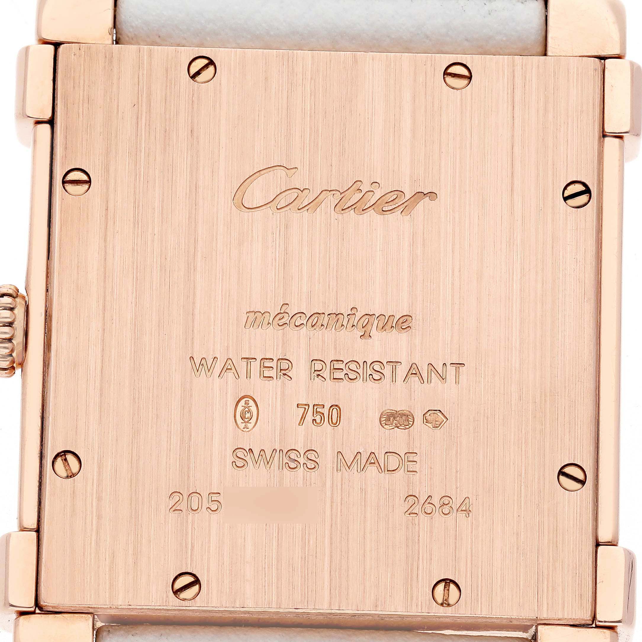 The image shows the back case of a Cartier Tank Louis WE300351 Women's Rose Gold Silver Dial model, highlighting engravings and the watch's fastening screws.