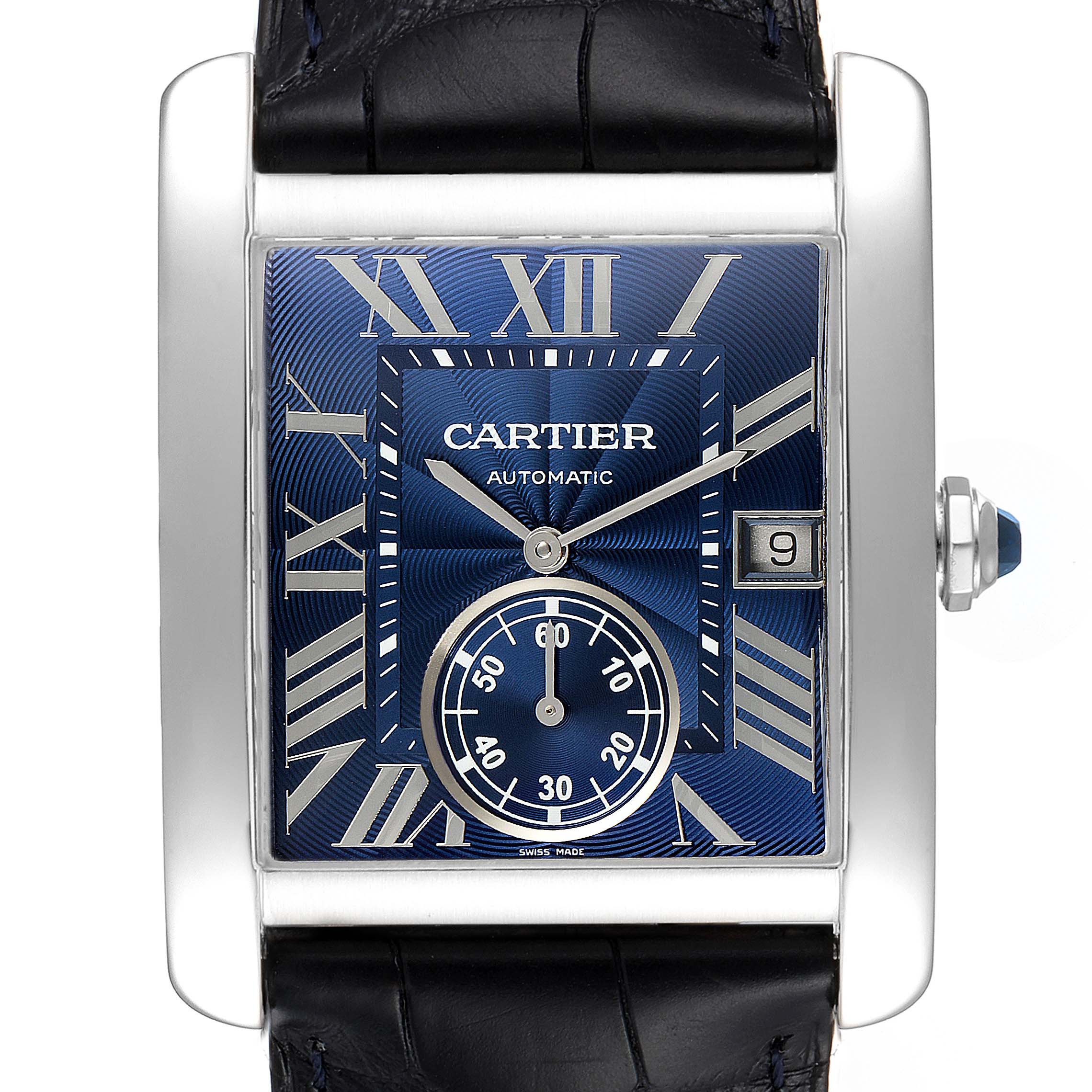 The image shows a Cartier Tank MC WSTA0010 Men's Stainless Steel Blue Dial WSTA0010 Men's Stainless Steel Blue Dial watch, featuring its blue dial, Roman numerals, date window, and sub-dial up close.