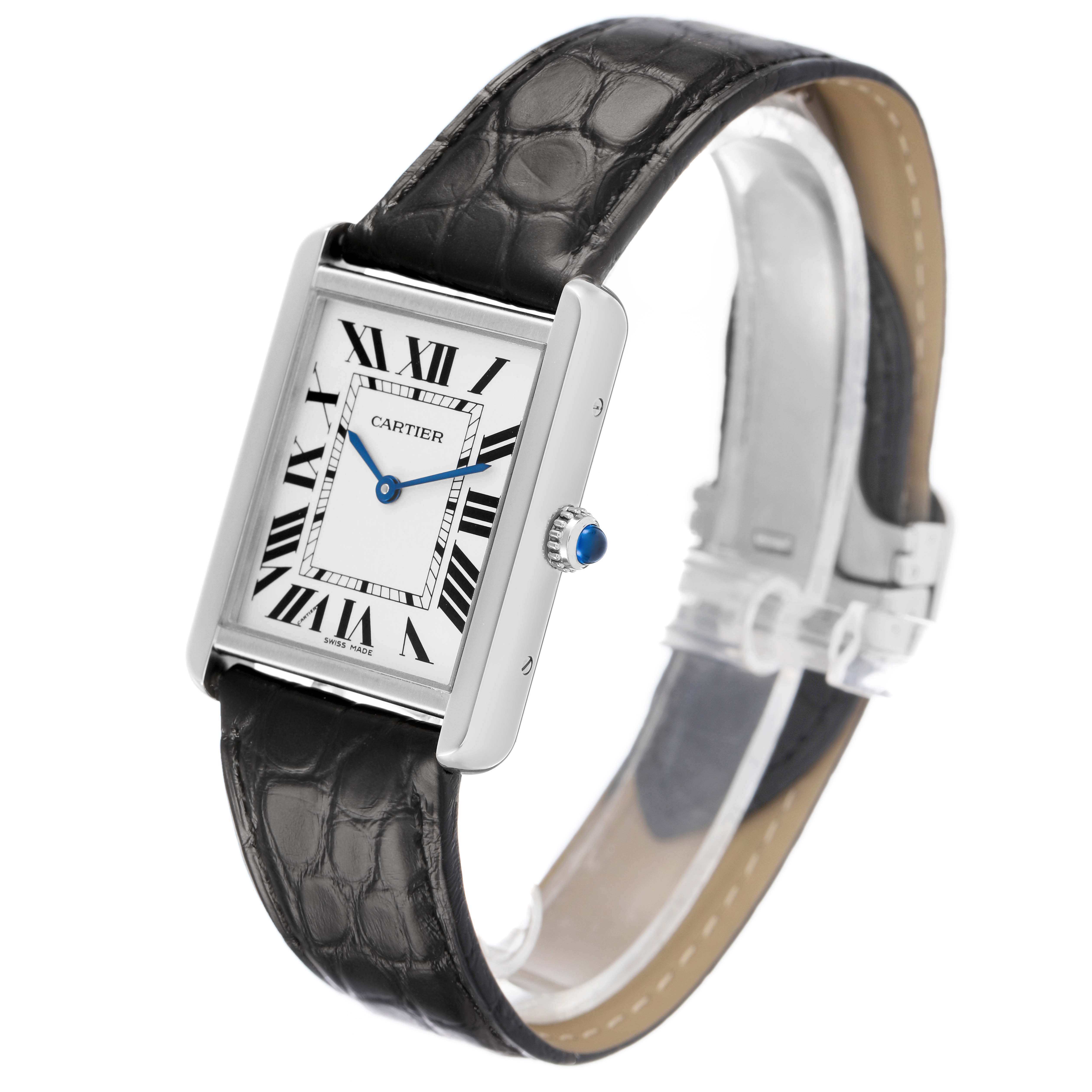 The Cartier Tank Solo WSTA0028 Men's Stainless Steel Silver Dial watch is shown at an angled side view, highlighting the face, Roman numerals, crown, and leather strap.