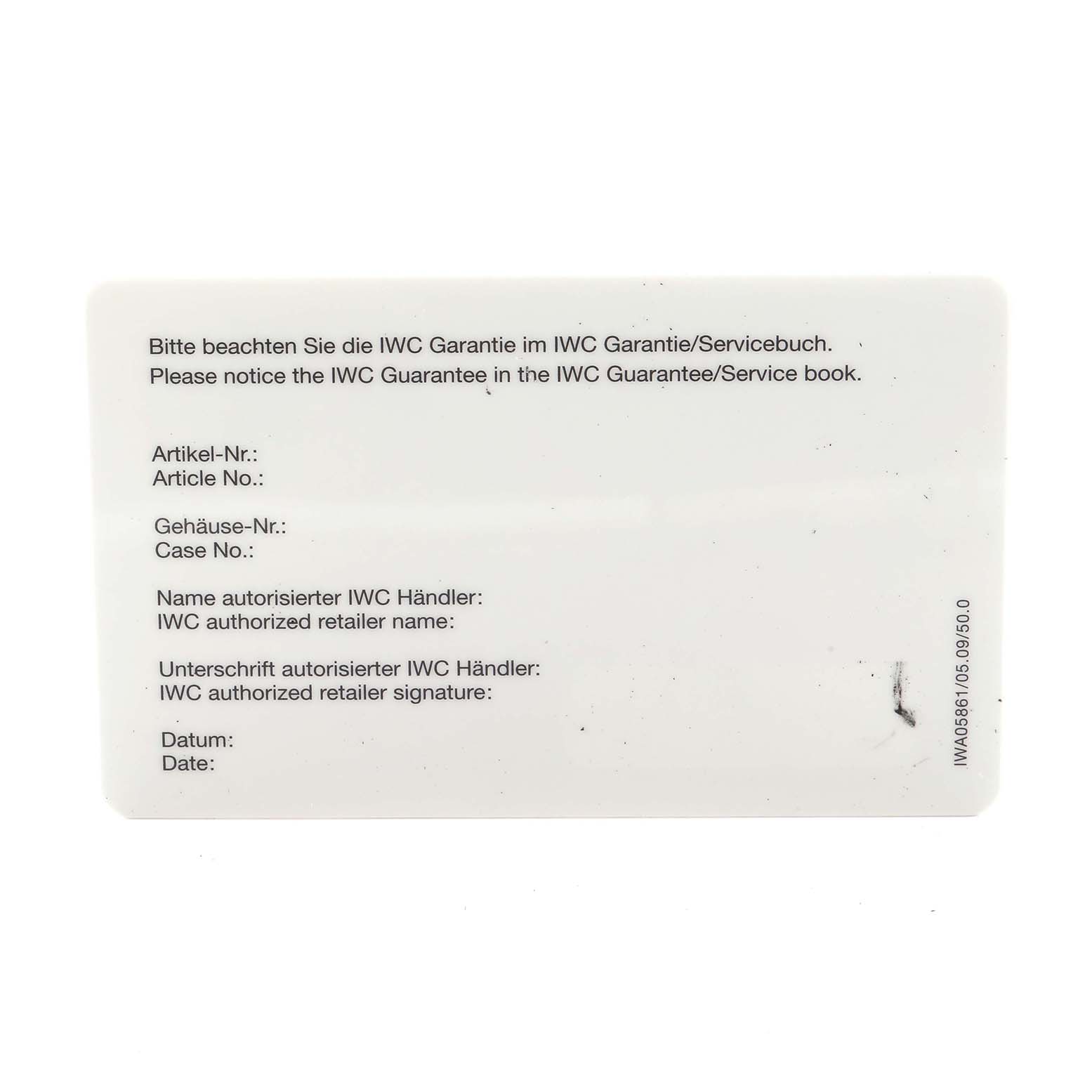 The image shows a warranty card for an IWC Pilot IW325505 Men
s Stainless Steel Silver Dial IW325505 Men
s Stainless Steel Silver Dial model, detailing article and case numbers, retailer name, and signature fields.