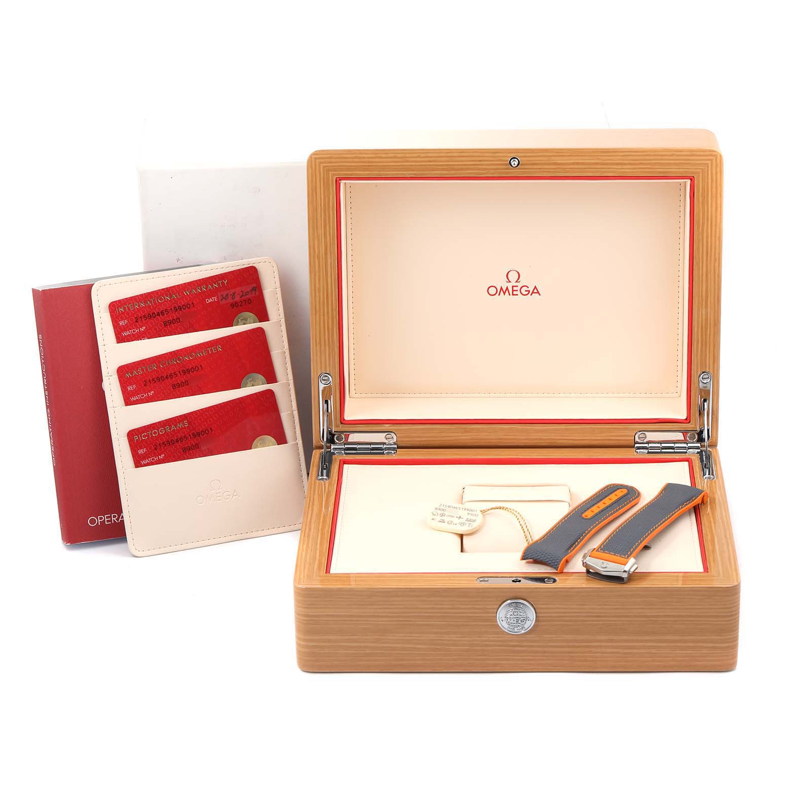 The image shows the box, additional strap, and warranty cards for the Omega Planet Ocean 215.90.46.51.99.001 Men's Titanium Grey Dial 215.90.46.51.99.001 Men's Titanium Grey Dial model.