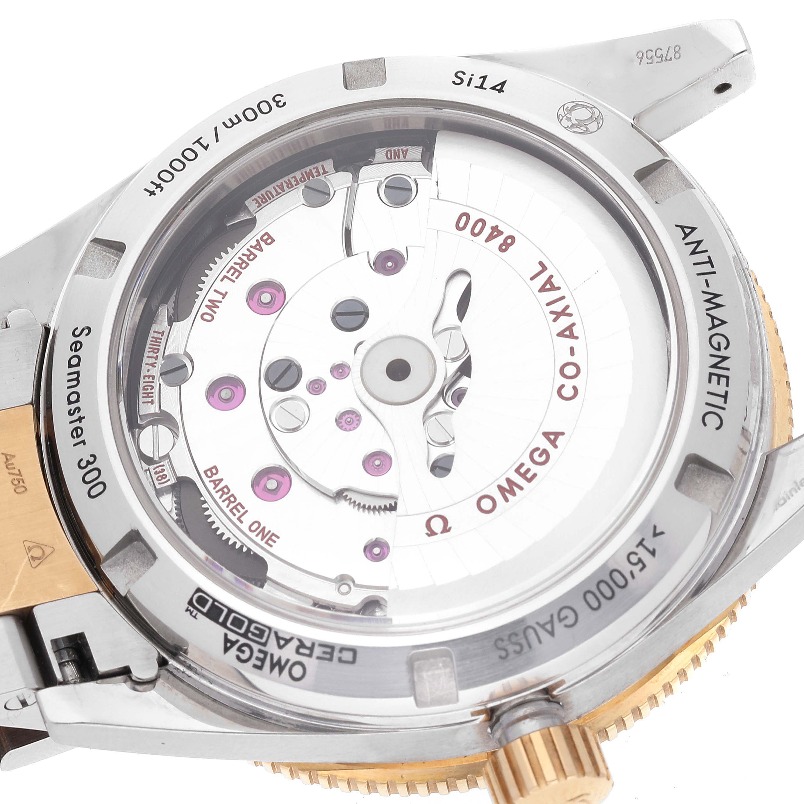 This image shows the back side of an Omega Seamaster 233.20.41.21.01.001 Men's Steel and Gold (two tone) Black Dial 233.20.41.21.01.001 Men's Steel and Gold (two tone) Black Dial watch, highlighting the visible movement and various internal components.