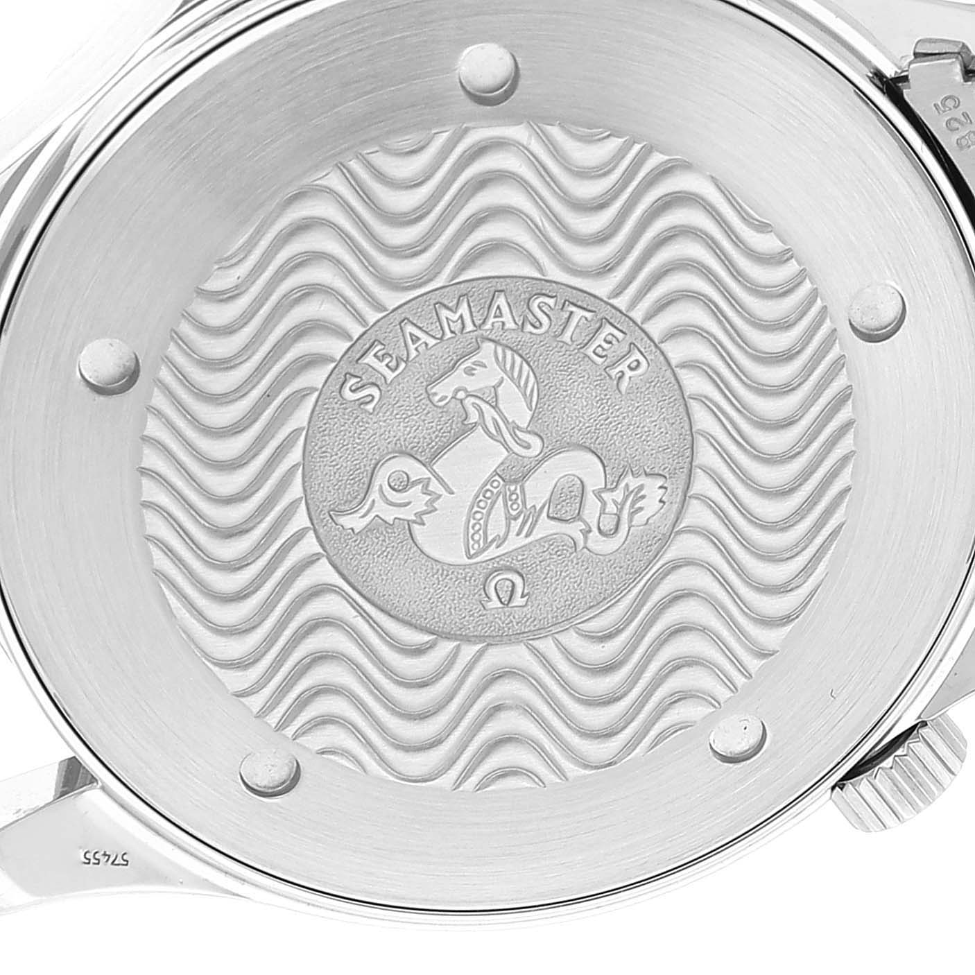 The image shows the case back of an Omega Seamaster 2541.80.00 Men's Stainless Steel Blue Dial 2541.80.00 Men's Stainless Steel Blue Dial watch with its engraved emblem and wave pattern design.