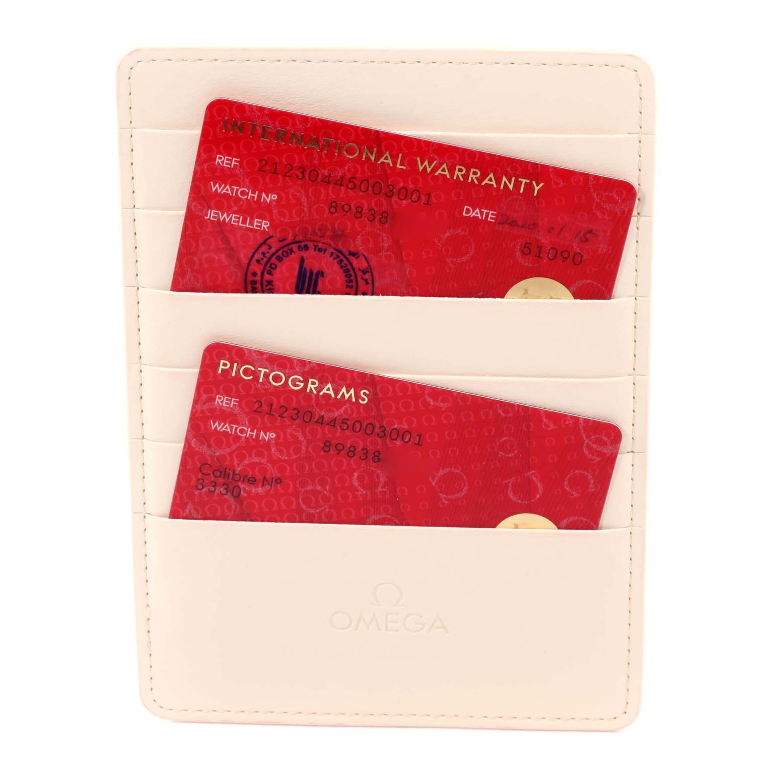 Image shows the warranty and pictogram cards for the Omega Seamaster 212.30.44.50.03.001 Men's Stainless Steel Blue Dial 212.30.44.50.03.001 Men's Stainless Steel Blue Dial, held in a beige Omega cardholder.