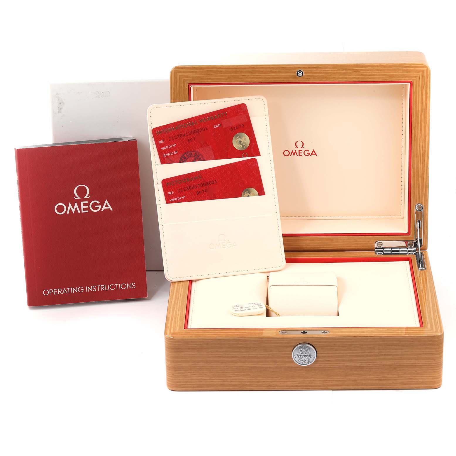 The image shows the accessories for an Omega Seamaster 212.30.41.20.03.001 Men's Stainless Steel Blue Dial 212.30.41.20.03.001 Men's Stainless Steel Blue Dial watch, including the presentation box, operating instructions, and identification cards.