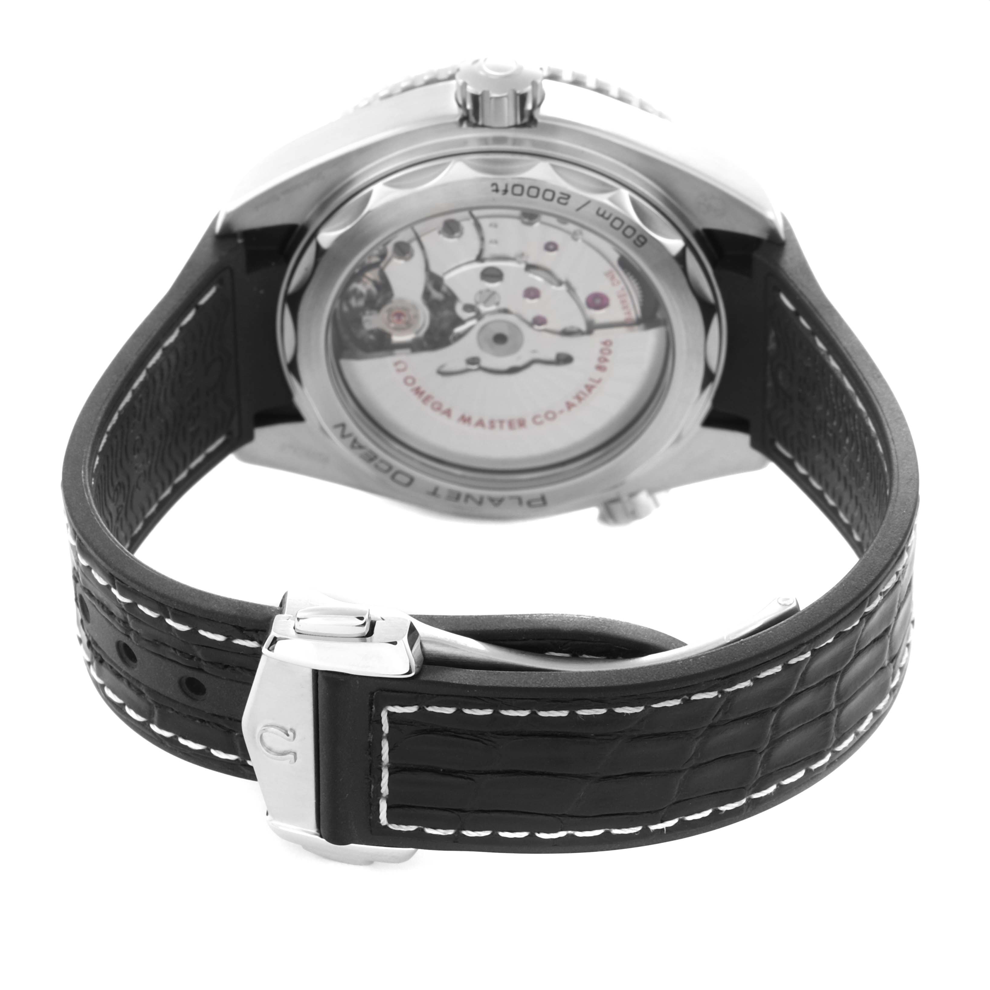 The Omega Planet Ocean 215.33.44.22.01.001 Men
s Stainless Steel Black Dial 215.33.44.22.01.001 Men
s Stainless Steel Black Dial watch is shown from the back, displaying its transparent case back and leather strap with a clasp.