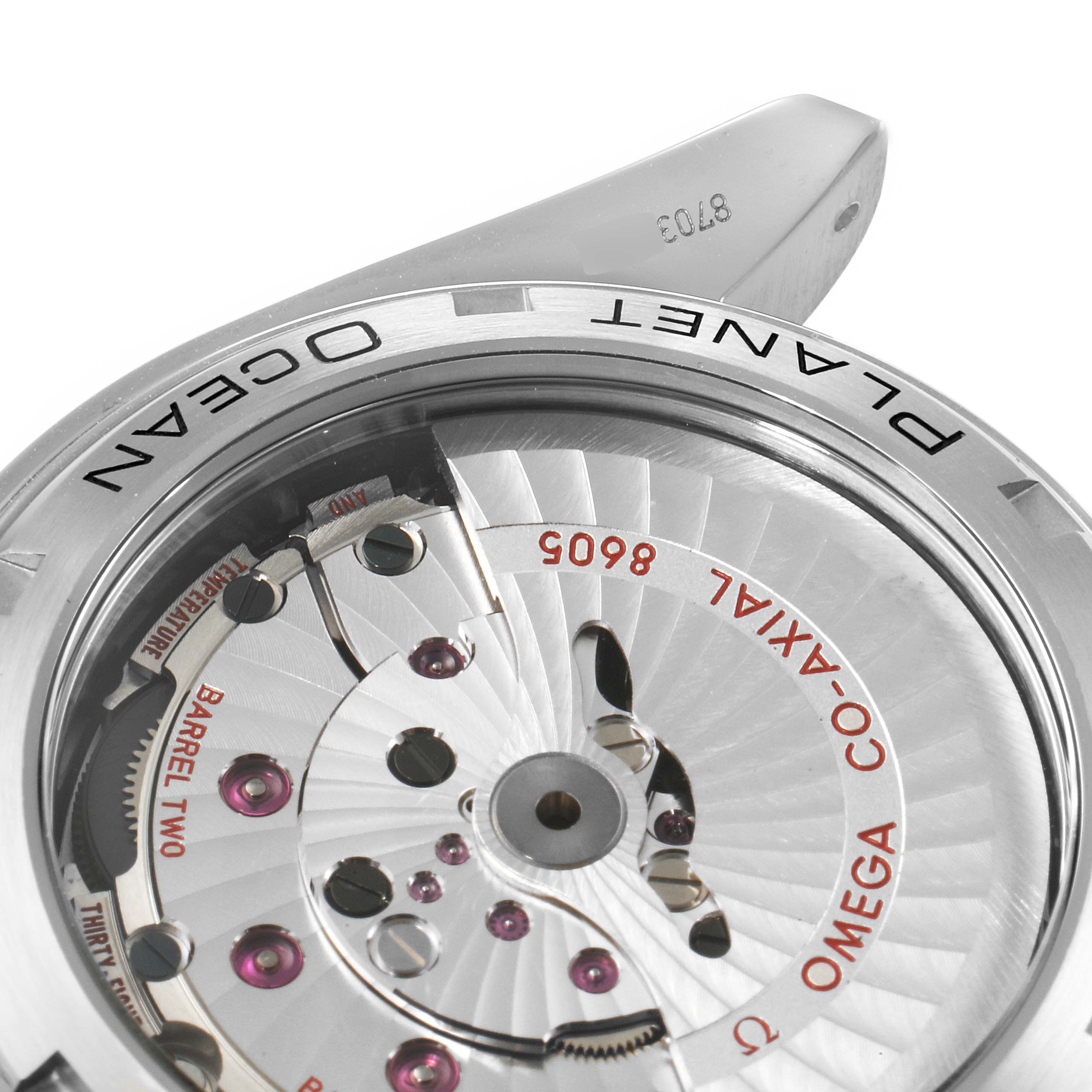 This image shows the back of the Omega Planet Ocean 232.30.44.22.01.001 Men
s Stainless Steel Black Dial 232.30.44.22.01.001 Men
s Stainless Steel Black Dial watch, revealing its intricate internal mechanical components.