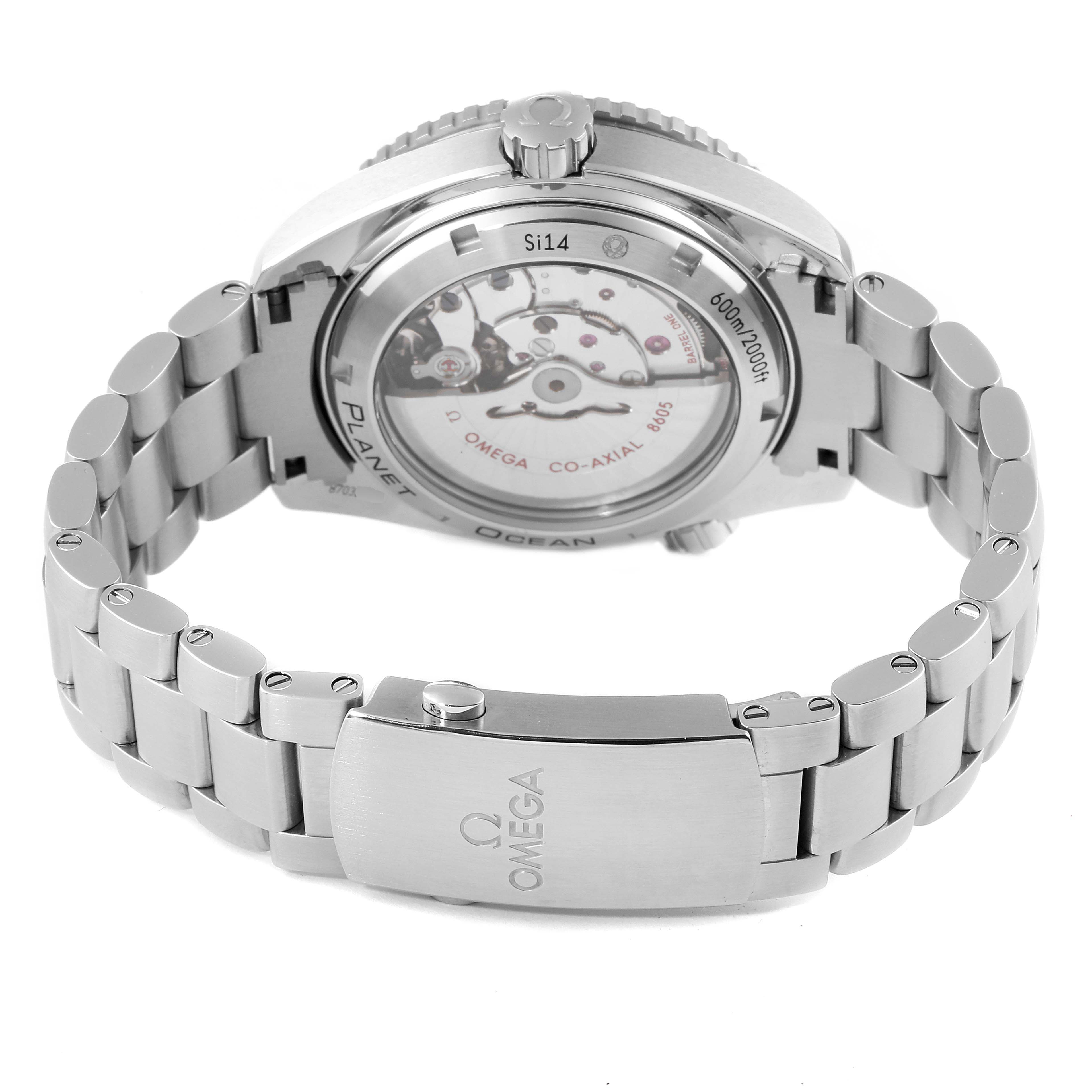 The image shows the back view of an Omega Planet Ocean 232.30.44.22.01.001 Men
s Stainless Steel Black Dial 232.30.44.22.01.001 Men
s Stainless Steel Black Dial watch, highlighting the transparent case back and stainless-steel bracelet.