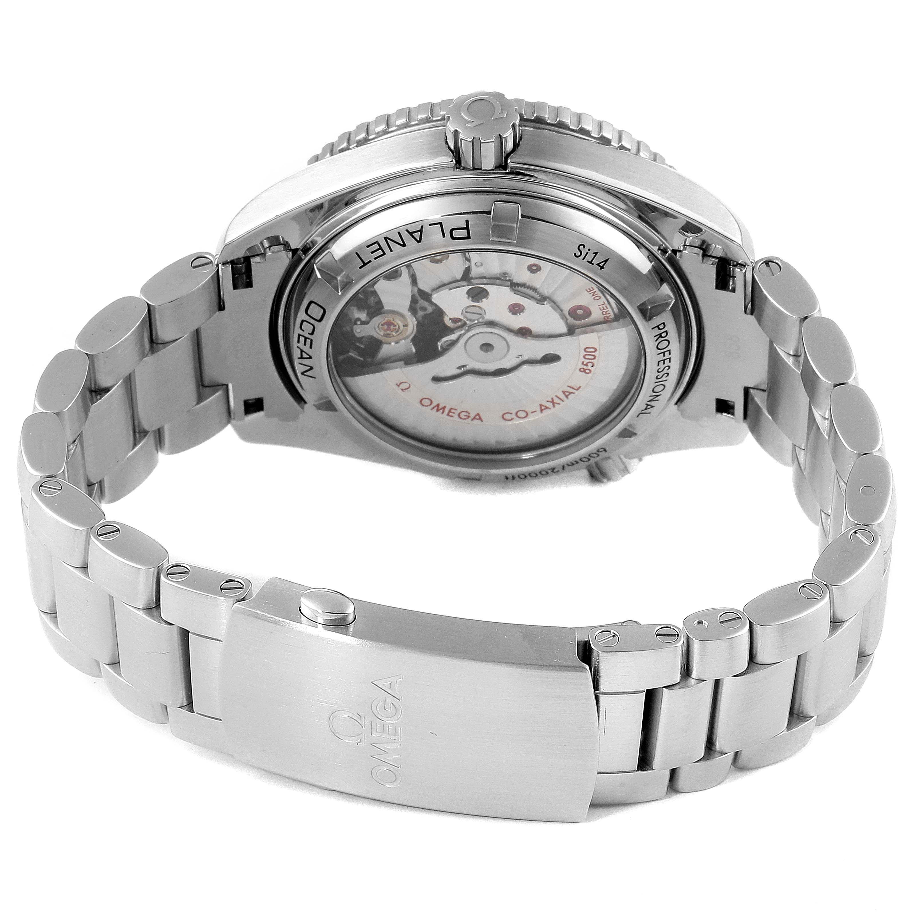 The image shows the back view and the bracelet of the Omega Planet Ocean 232.30.42.21.01.001 Men's Stainless Steel Black Dial 232.30.42.21.01.001 Men's Stainless Steel Black Dial watch, highlighting the movement through a transparent case back.