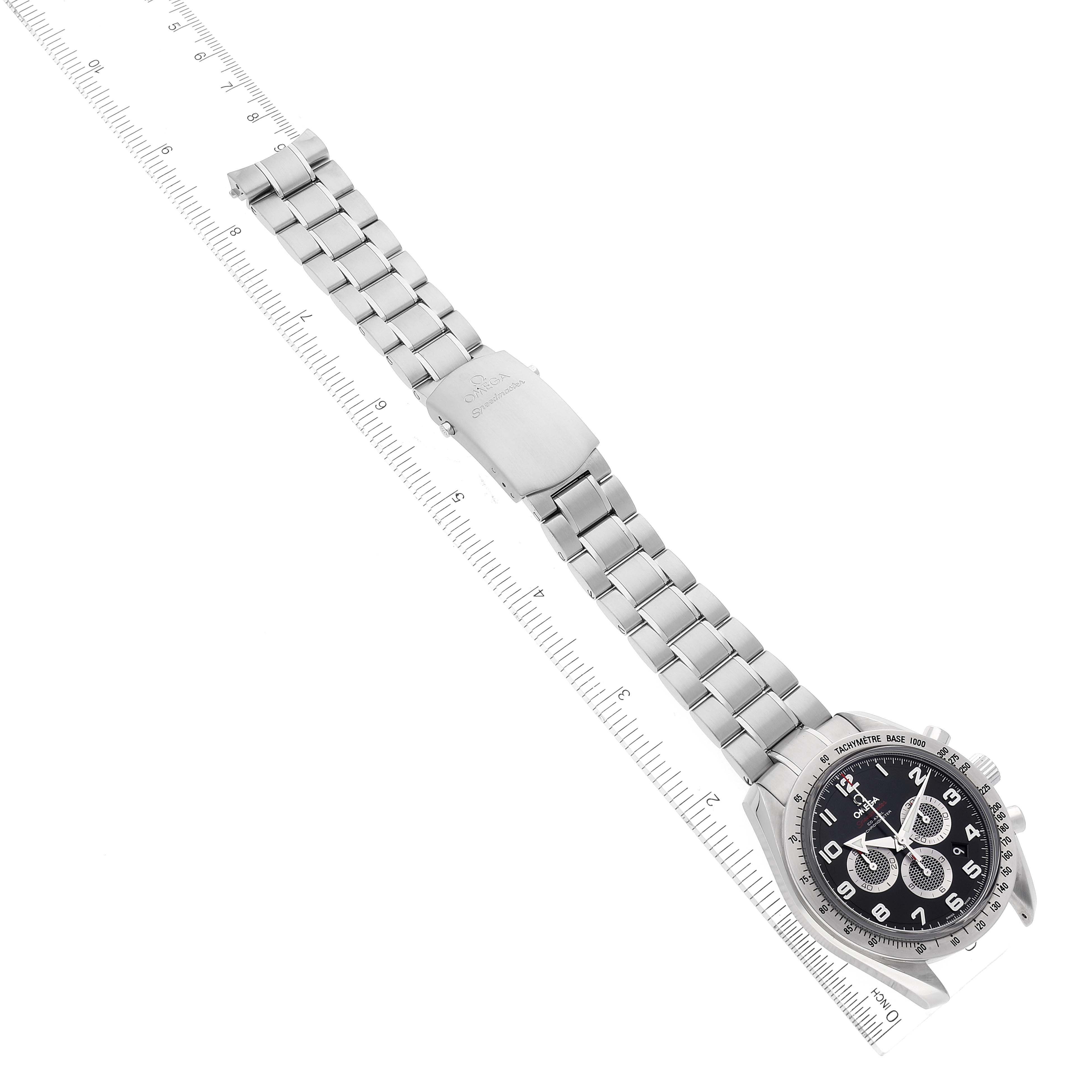 The Omega Speedmaster 321.10.44.50.01.001 Men
s Stainless Steel Black Dial 321.10.44.50.01.001 Men
s Stainless Steel Black Dial watch is shown at an angle, highlighting the bracelet, clasp, and full face with a ruler for scale.