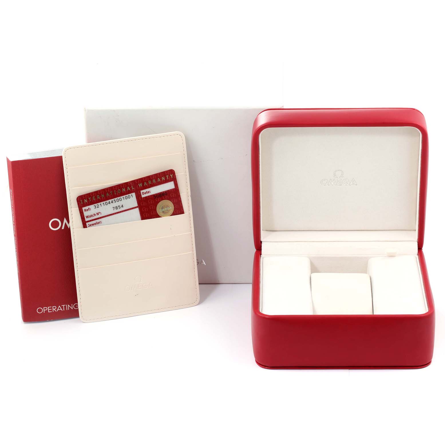 The image shows an Omega Speedmaster 321.10.44.50.01.001 Men
s Stainless Steel Black Dial 321.10.44.50.01.001 Men
s Stainless Steel Black Dial box, an International Warranty card, and an operating manual at an eye-level angle.