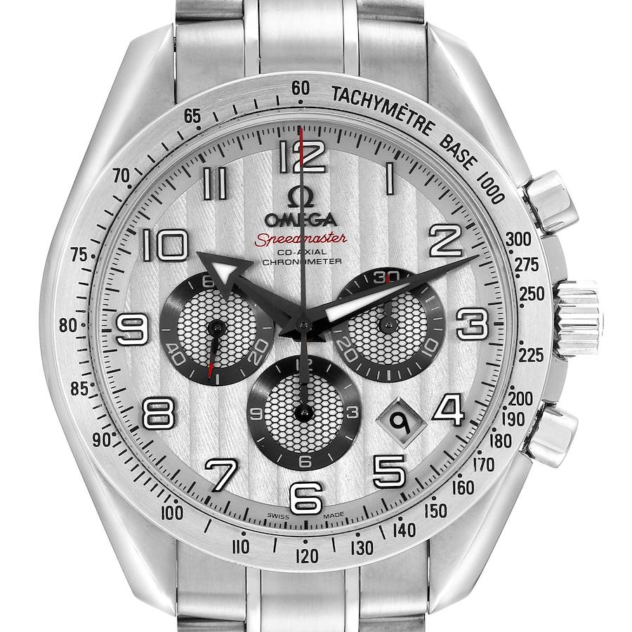 The Omega Speedmaster watch is shown from a front angle displaying its face, bezel, chronograph subdials, and part of the bracelet.