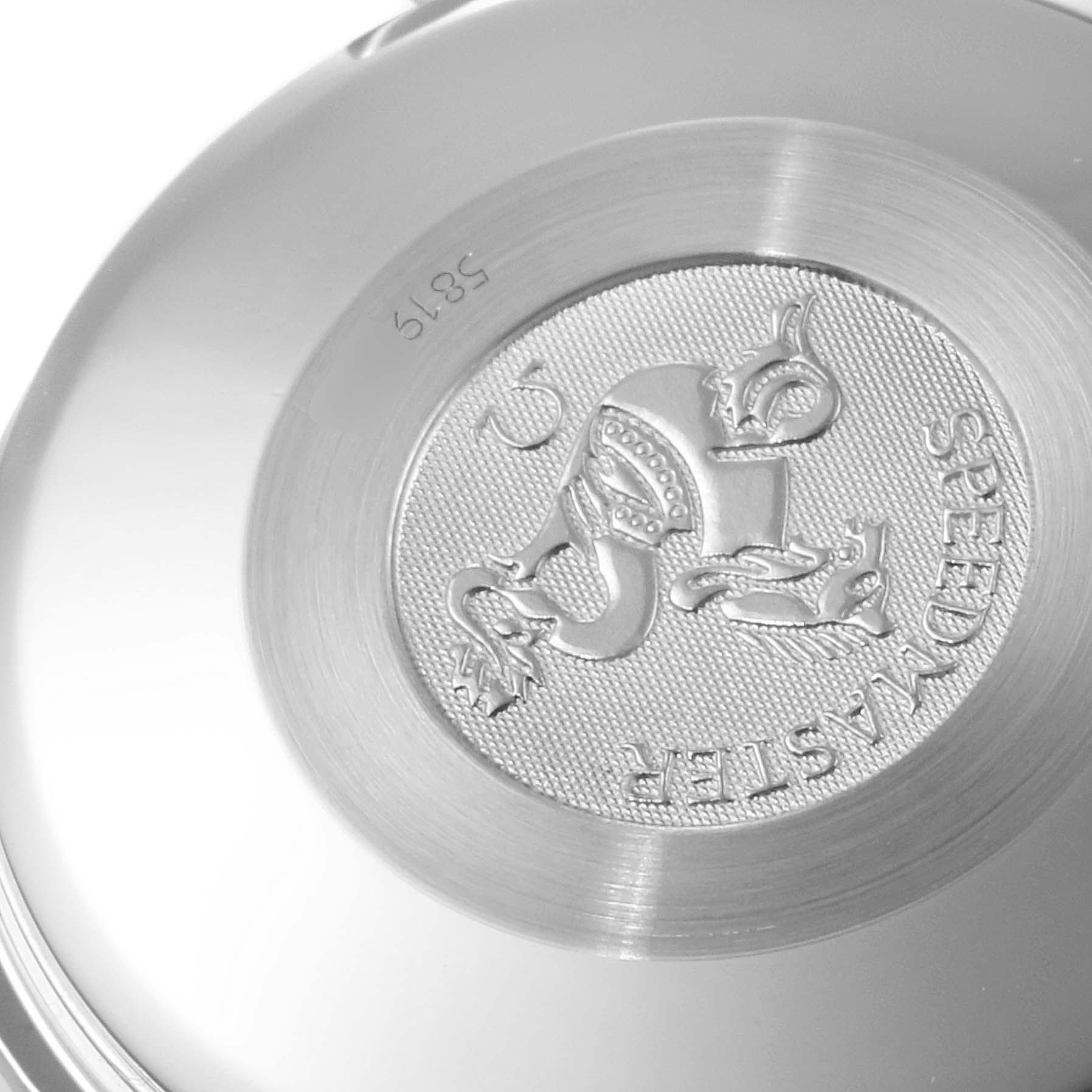 This image shows the back casing of an Omega Speedmaster 3520.50.00 Men
s Stainless Steel Black Dial 3520.50.00 Men
s Stainless Steel Black Dial watch, featuring the engraved logo and serial number.