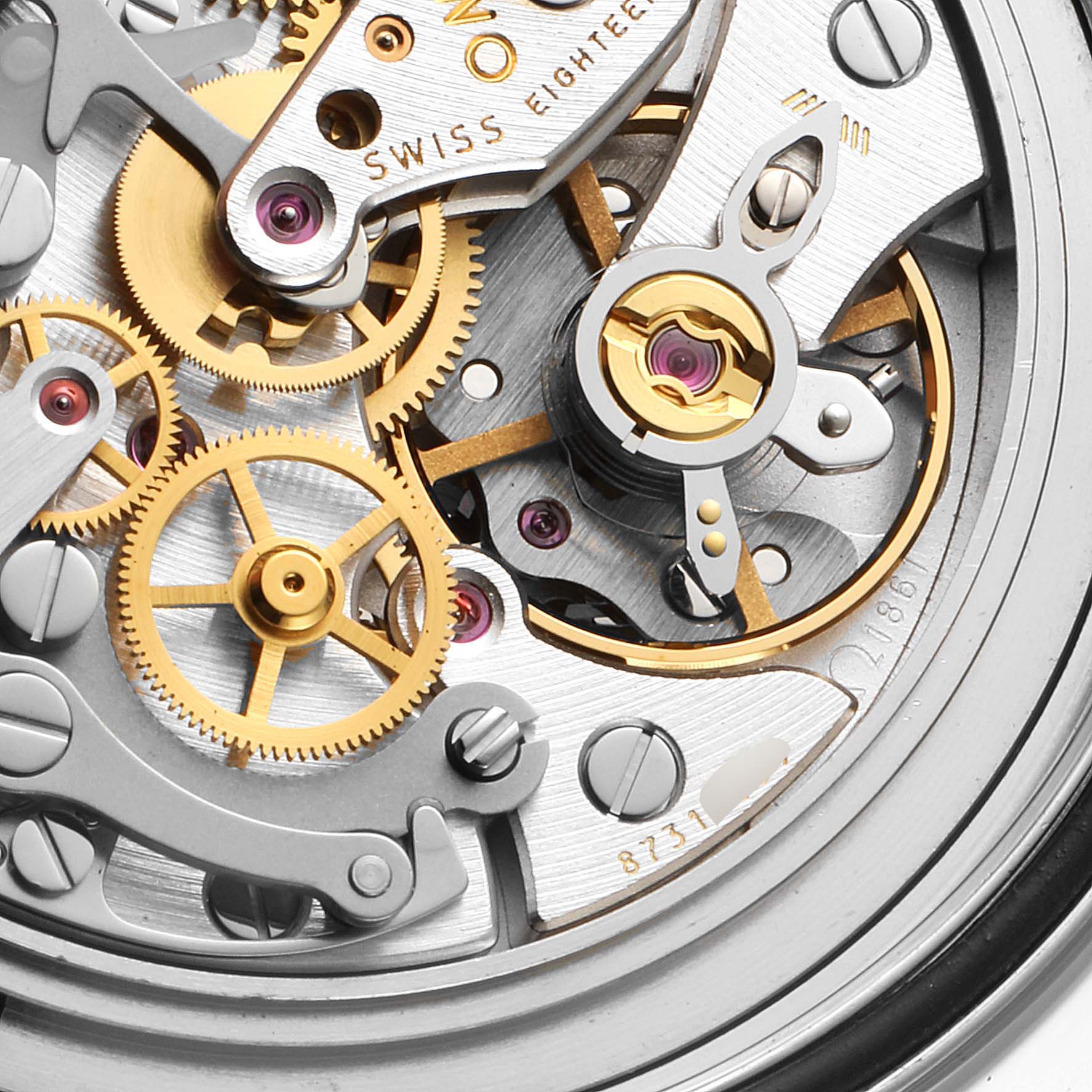 This close-up image shows the intricate internal gears and mechanisms of an Omega Speedmaster 311.30.42.30.01.005 Men
s Stainless Steel Black Dial 311.30.42.30.01.005 Men
s Stainless Steel Black Dial watch.