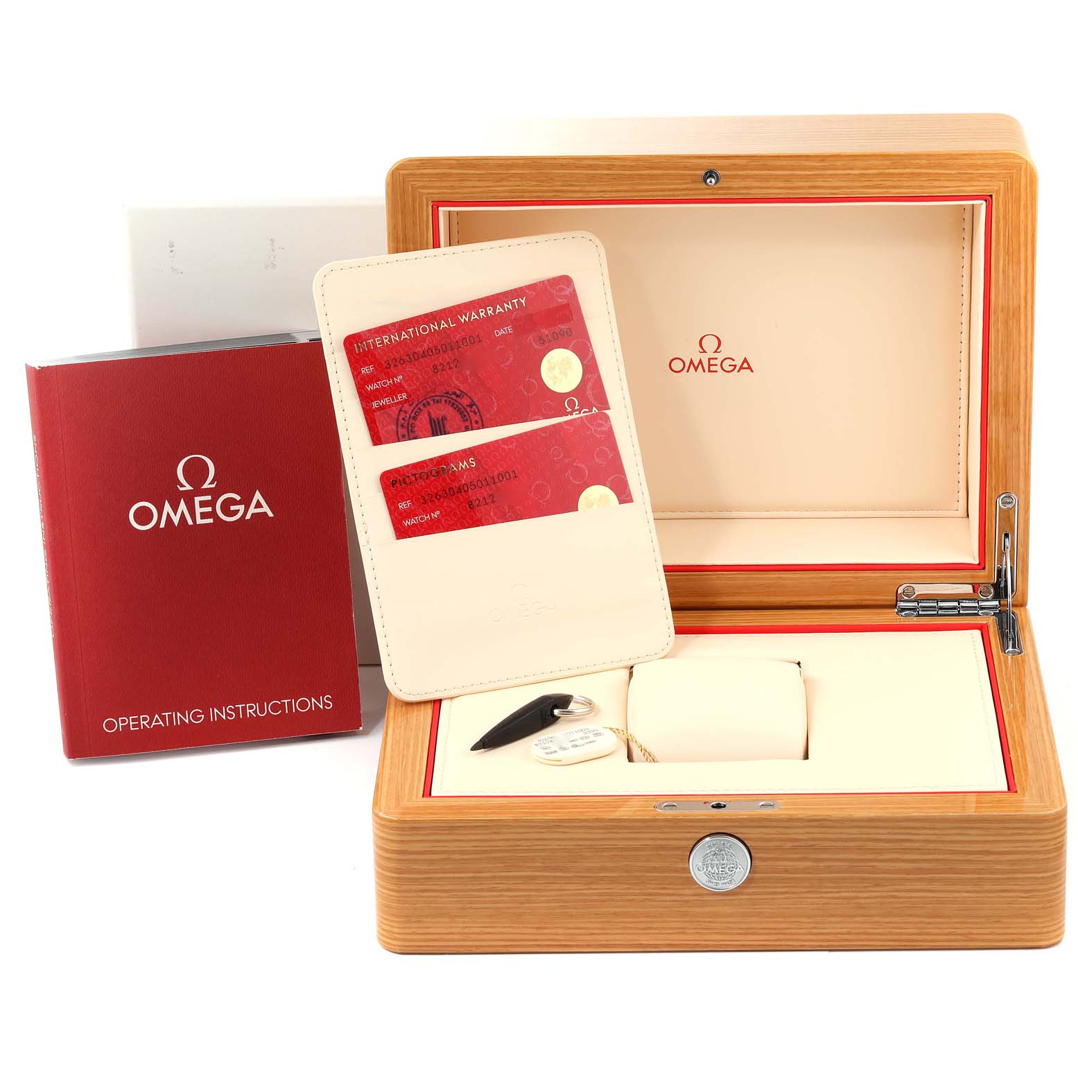 The image shows an Omega Speedmaster 326.30.40.50.11.001 Men
s Stainless Steel Red Dial 326.30.40.50.11.001 Men
s Stainless Steel Red Dial
s wooden box, warranty cards, and operating instructions.