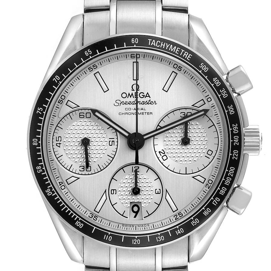 The Omega Speedmaster watch is shown from a front angle, highlighting the dial, tachymeter bezel, and subdials.