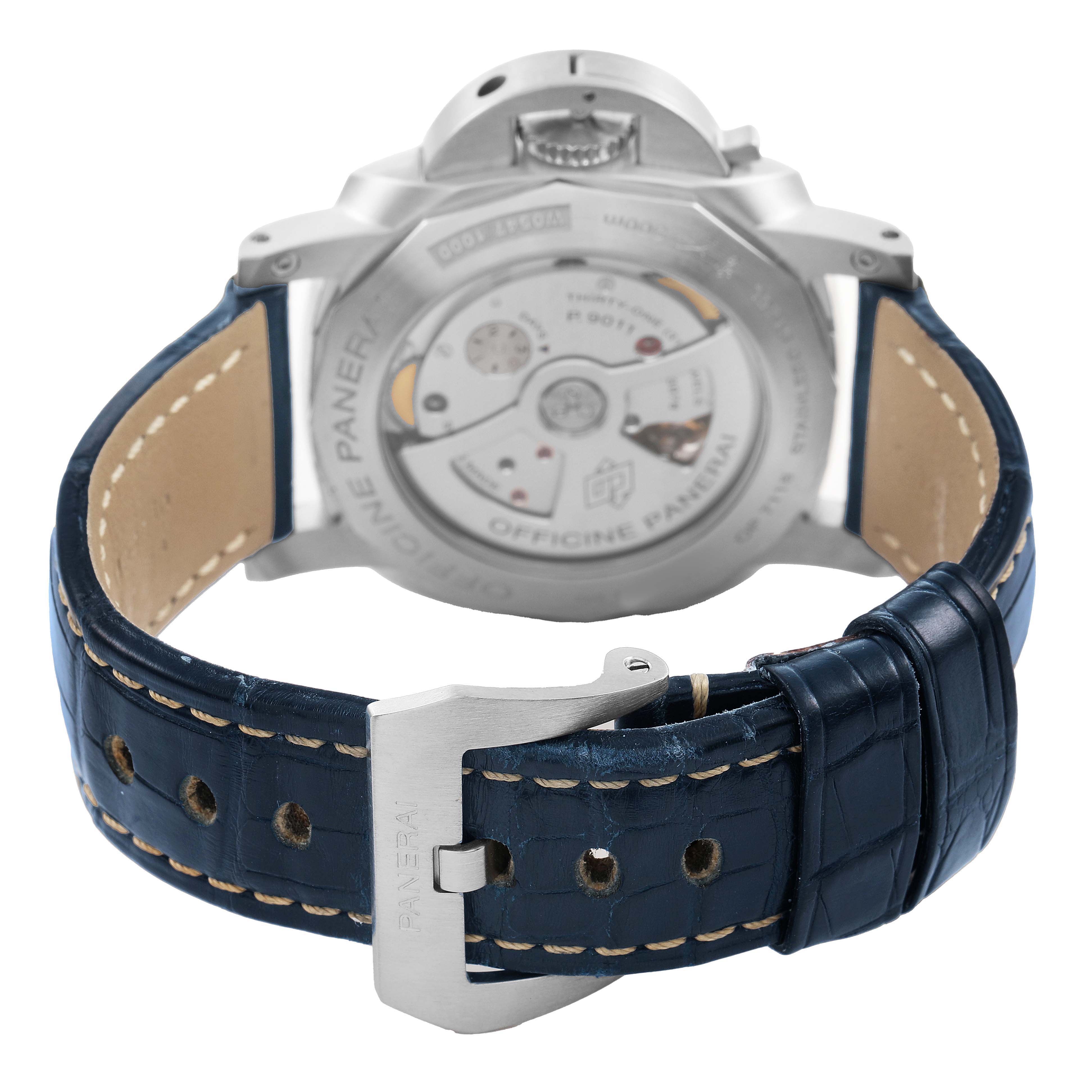 The image shows the back of a Panerai Luminor PAM01033 Men's Stainless Steel Blue Dial watch, highlighting the movement and blue leather strap with a buckle.