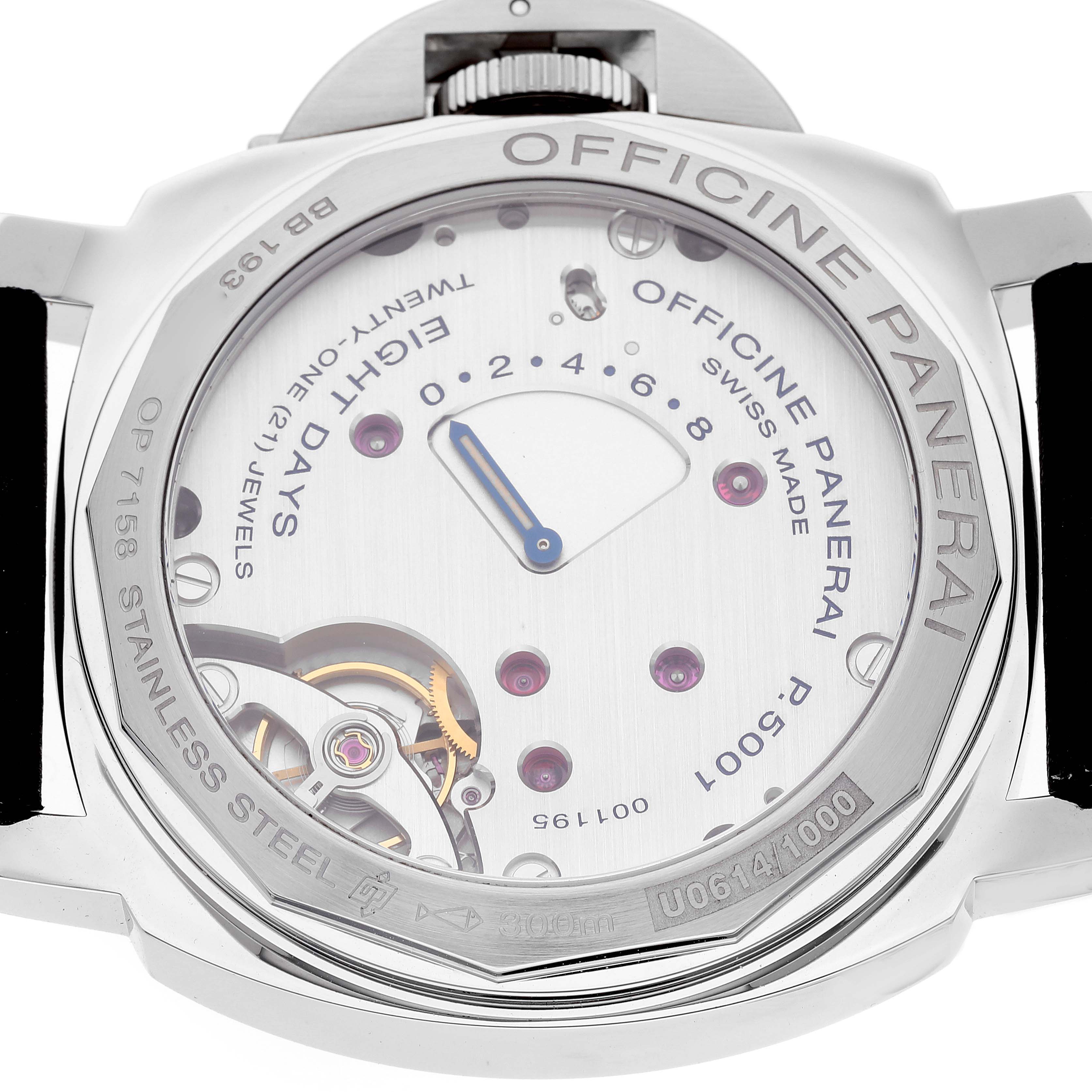 The image shows the back view of a Panerai Luminor PAM00796 Men
s Stainless Steel Black Dial PAM00796 Men
s Stainless Steel Black Dial model watch, highlighting its intricate movement and markings.