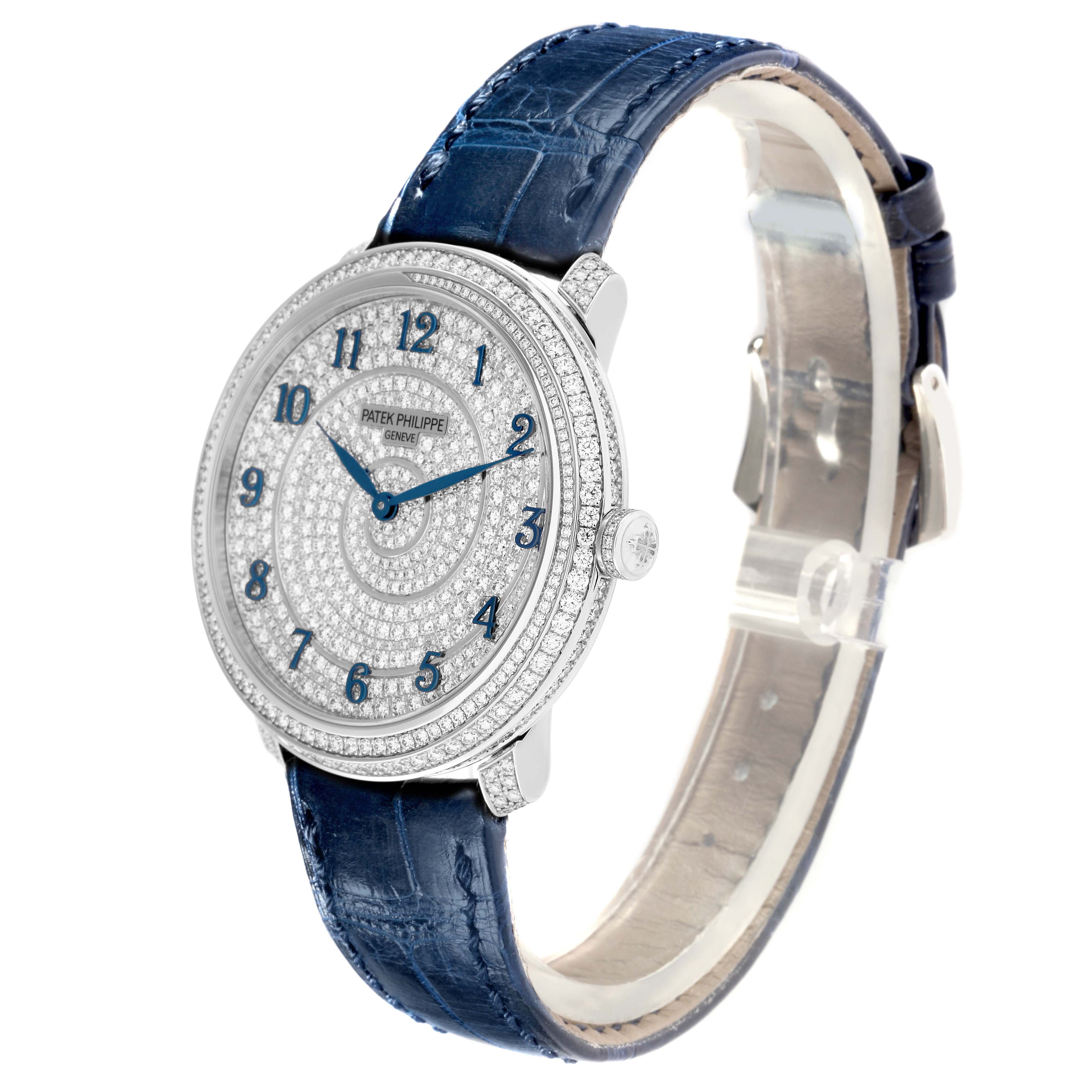The Patek Philippe Calatrava 4978/400G-001 Men
s White Gold Silver Dial 4978/400G-001 Men
s White Gold Silver Dial watch is shown at a slight angle, highlighting its diamond-studded face and blue leather strap.