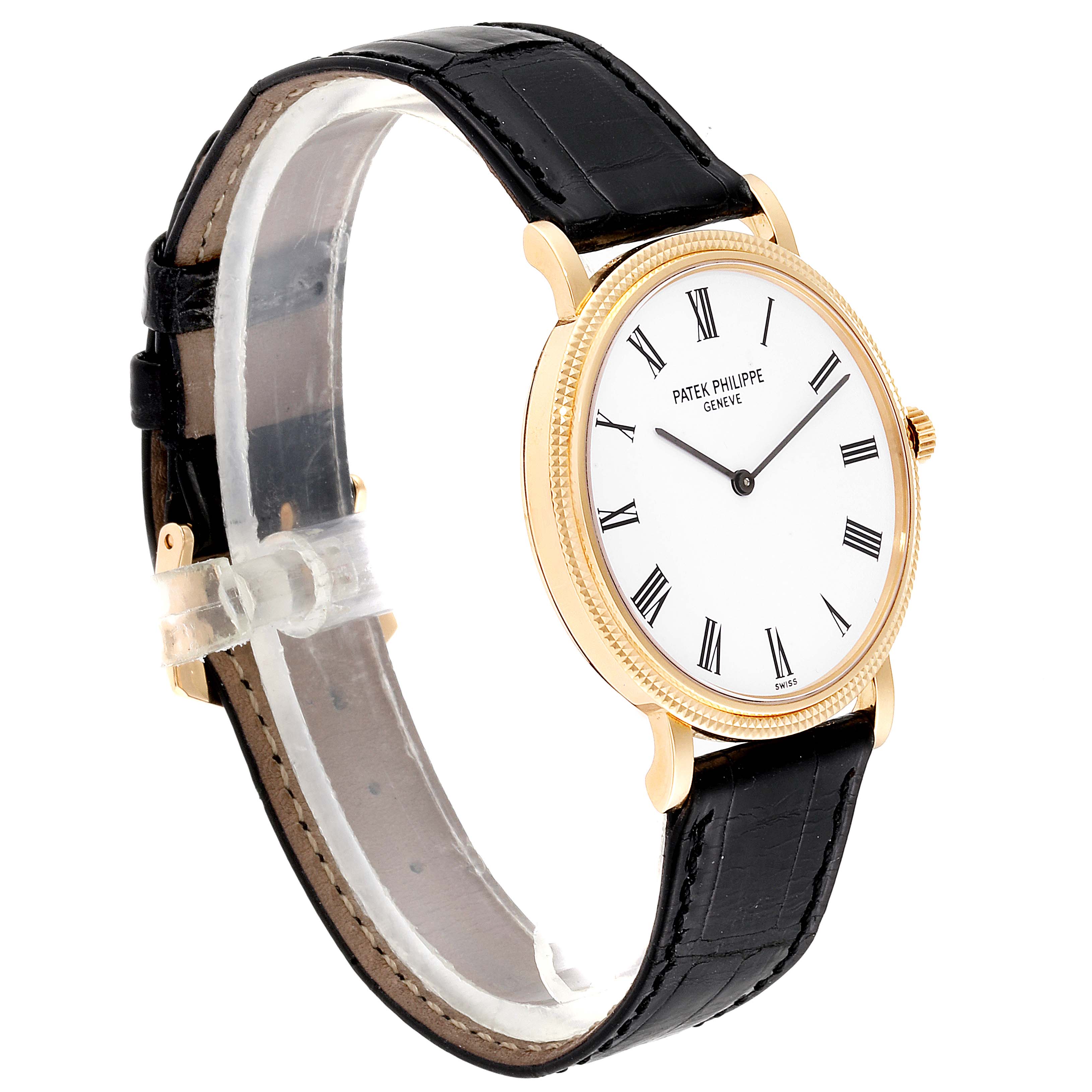 This is a side angle view of the Patek Philippe Calatrava 5120J Men's Yellow Gold White Dial 5120J Men's Yellow Gold White Dial watch, showing the dial, case, crown, and strap.