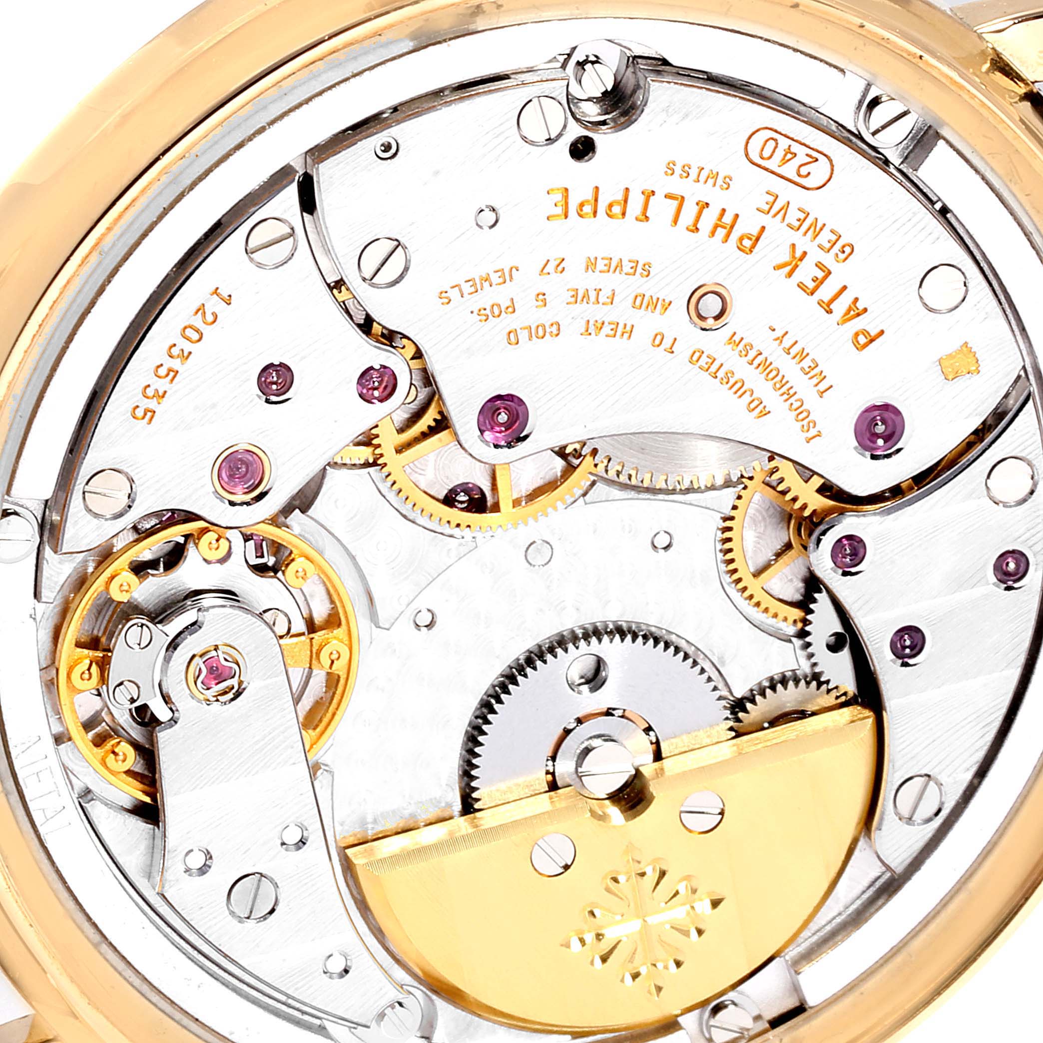 The image shows the movement and mechanism of a Patek Philippe Calatrava 5120J Men's Yellow Gold White Dial 5120J Men's Yellow Gold White Dial watch from a close-up, back view angle.
