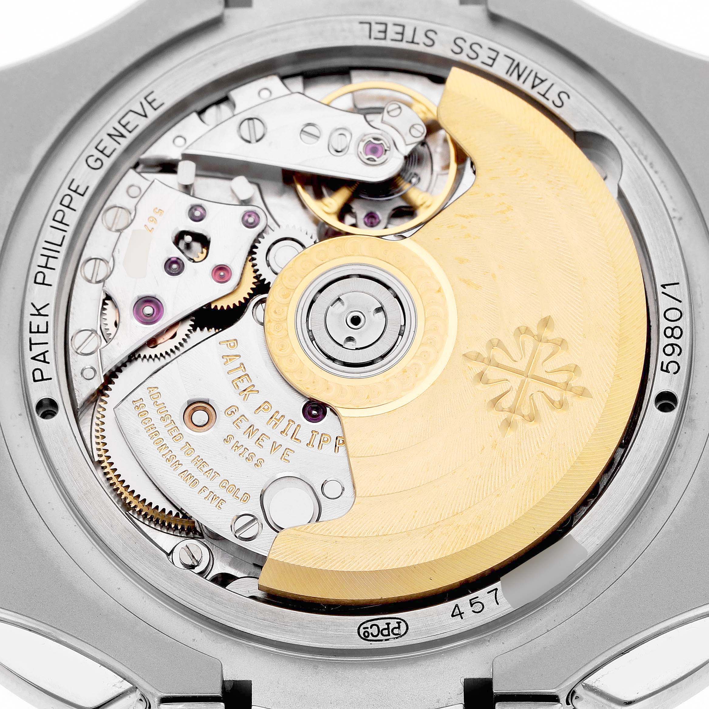 The image shows the movement of a Patek Philippe Nautilus 5980/1A-019 Men's Stainless Steel White Dial watch from the back, highlighting the rotor and intricate components.