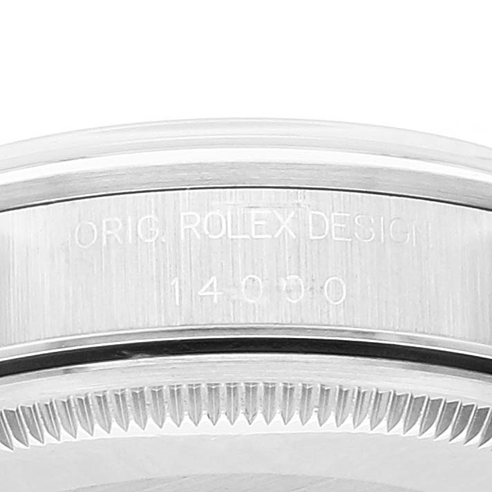 The image shows a close-up of the case back edge and the bezel of a Rolex Air-King 14000 Men's Stainless Steel Blue Dial 14000 Men's Stainless Steel Blue Dial watch, displaying the engravings.
