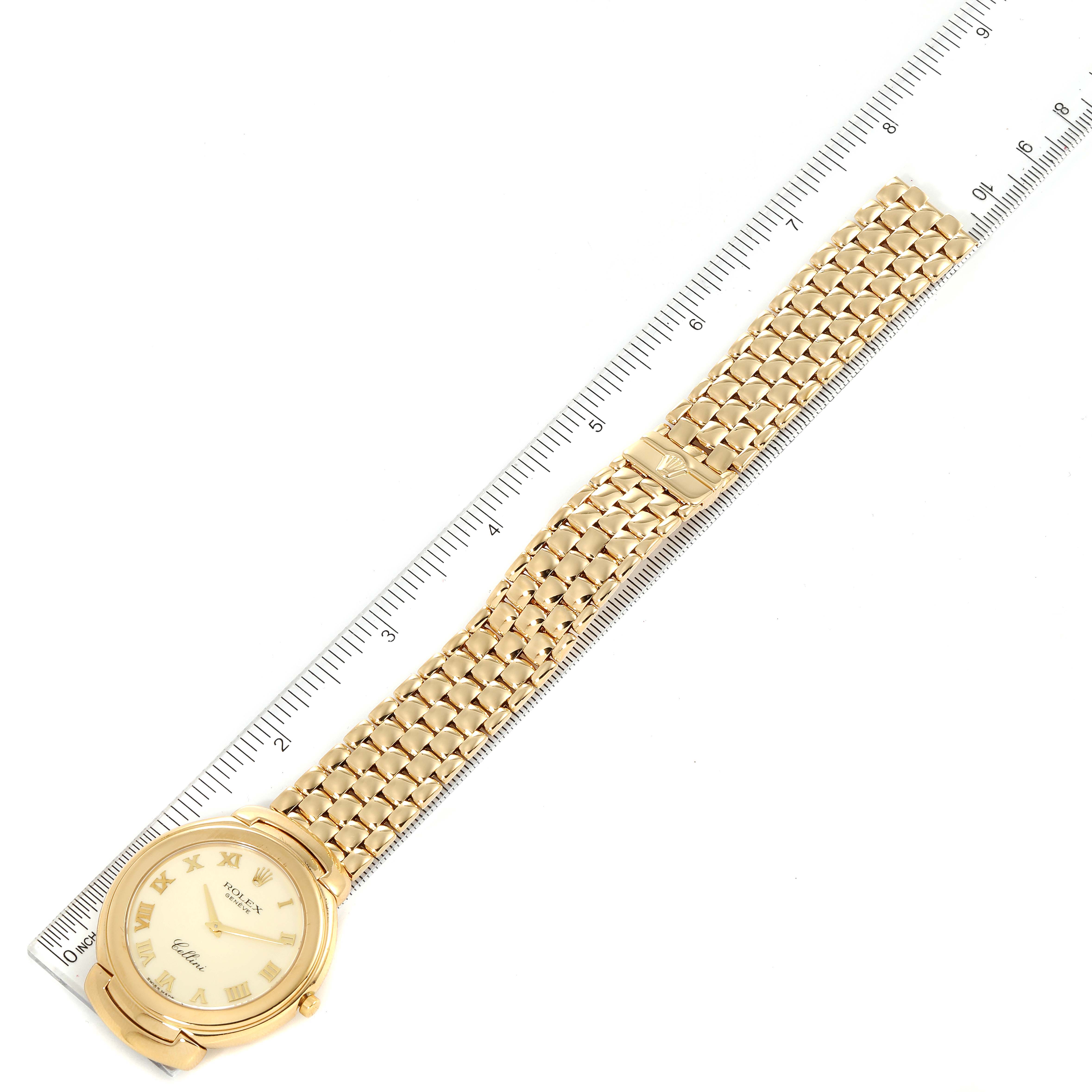 This image shows a Rolex Cellini 6623 Men's Yellow Gold Beige Dial 6623 Men's Yellow Gold Beige Dial watch laid flat with its full length and gold bracelet visible next to a ruler for scale.