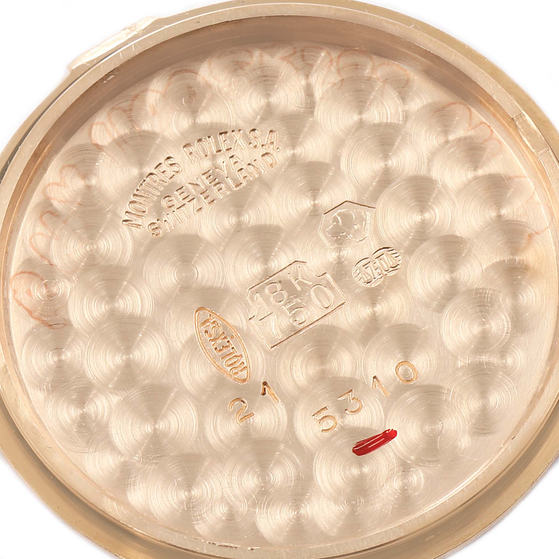 This image shows the inner case back of a Rolex Cellini 5310 Women's Rose Gold White Dial 5310 Women's Rose Gold White Dial watch, with various inscriptions and hallmarks.