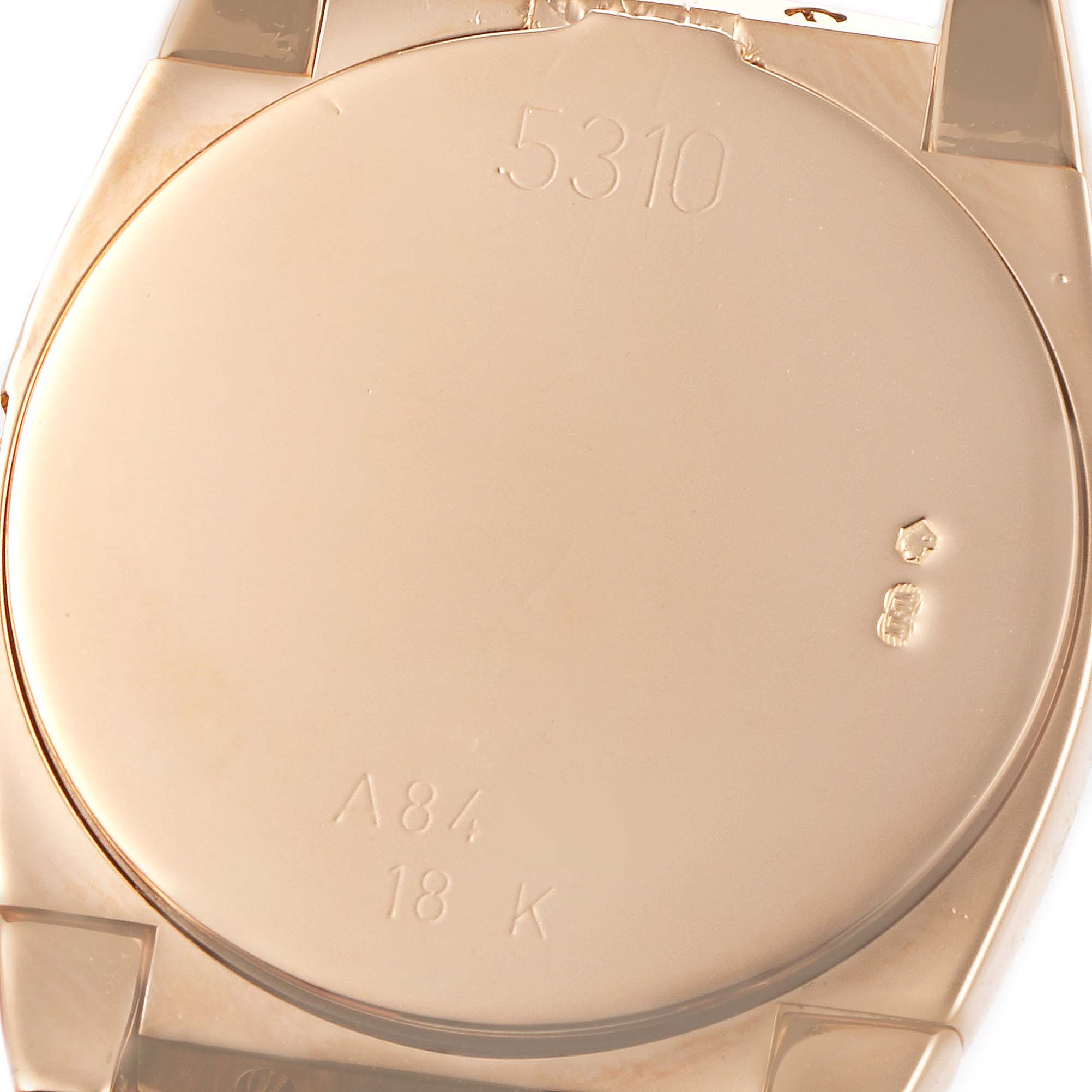 This image shows the back case of a Rolex Cellini 5310 Women's Rose Gold White Dial 5310 Women's Rose Gold White Dial model watch, highlighting its inscriptions and markings.