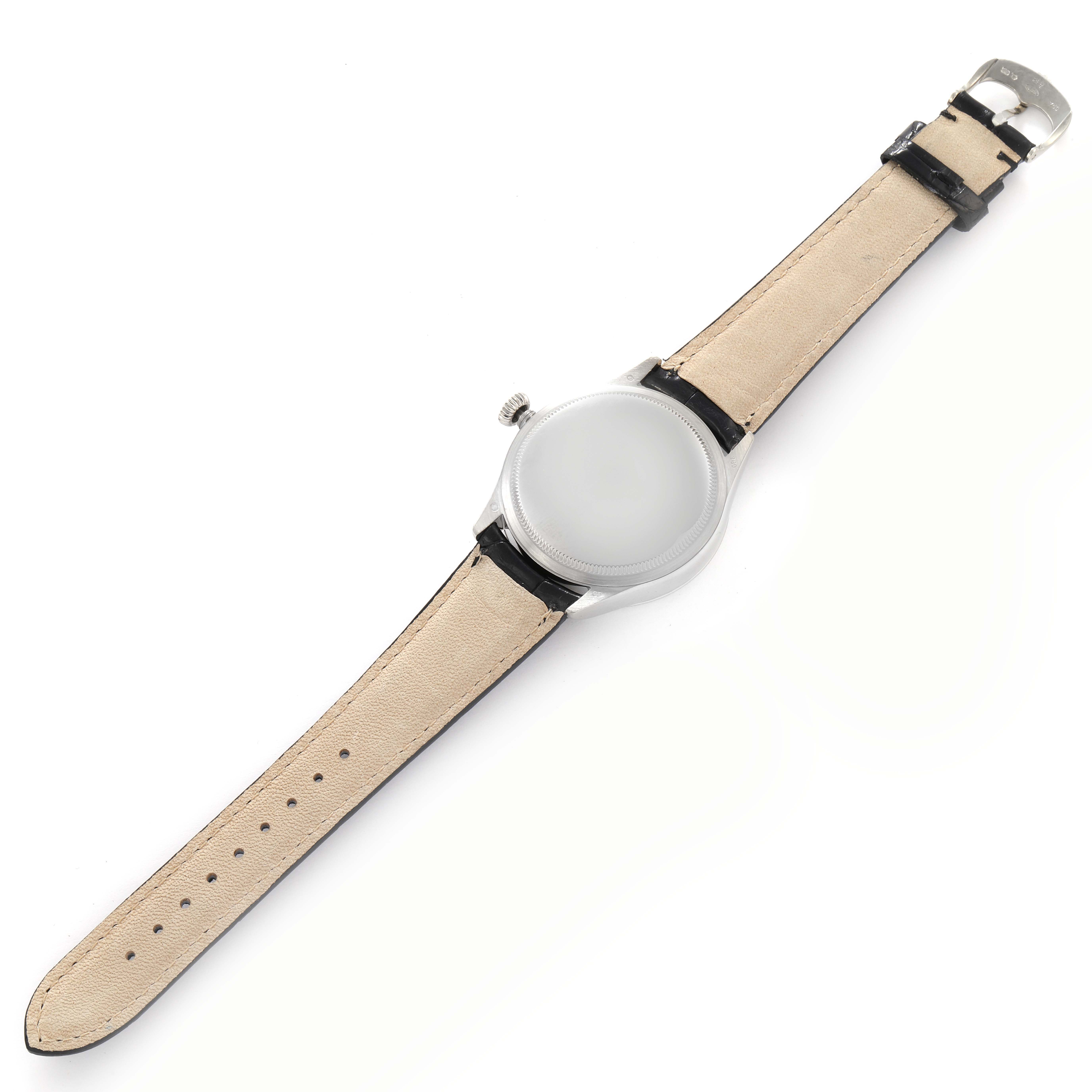 The Rolex Cellini 50519 Men's White Gold Silver Dial 50519 Men's White Gold Silver Dial watch is shown from the back, displaying the strap and case back.