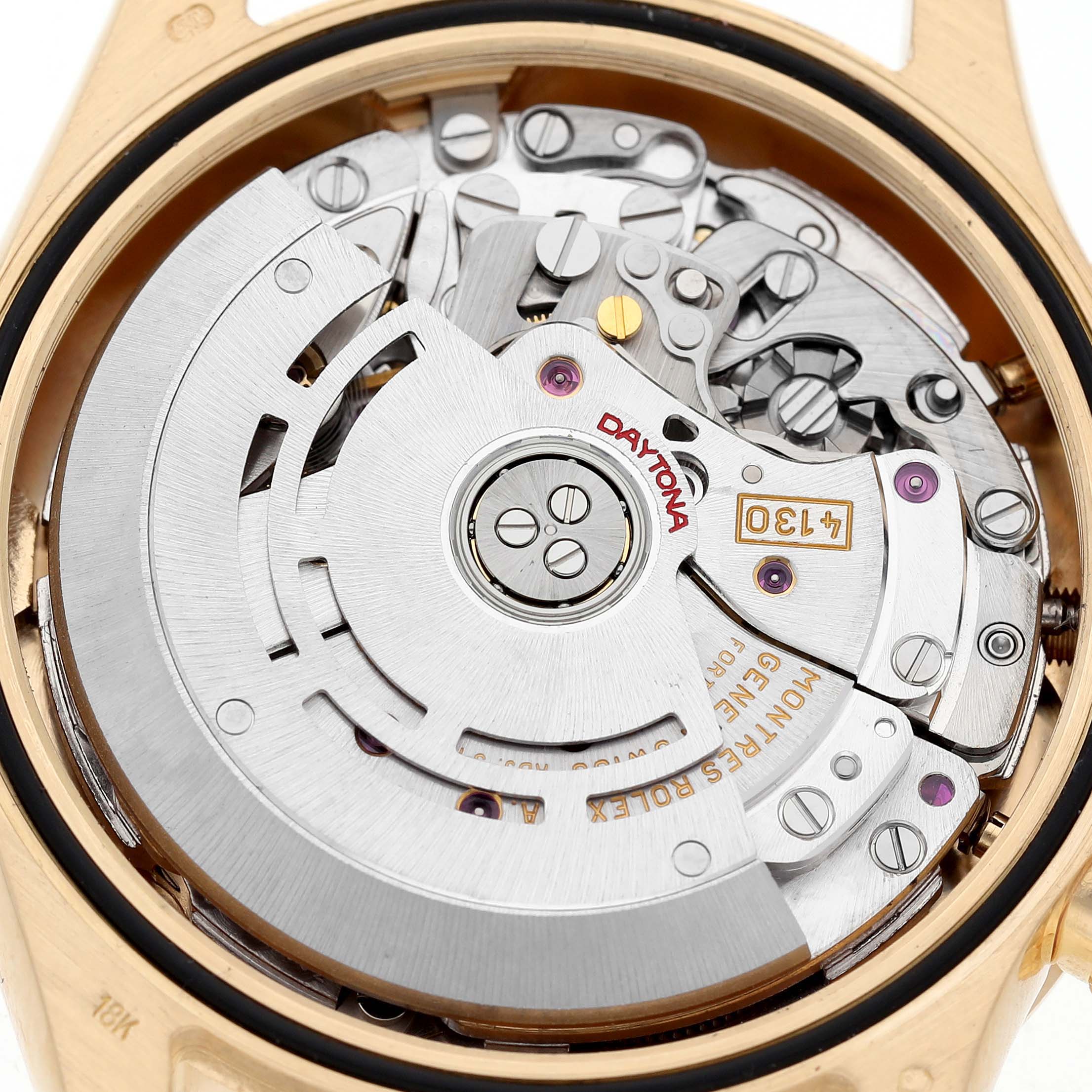 The image shows the movement of a Rolex Daytona 116528 Men's Yellow Gold Champagne Dial, focusing on its intricate mechanical parts from a top-down angle.