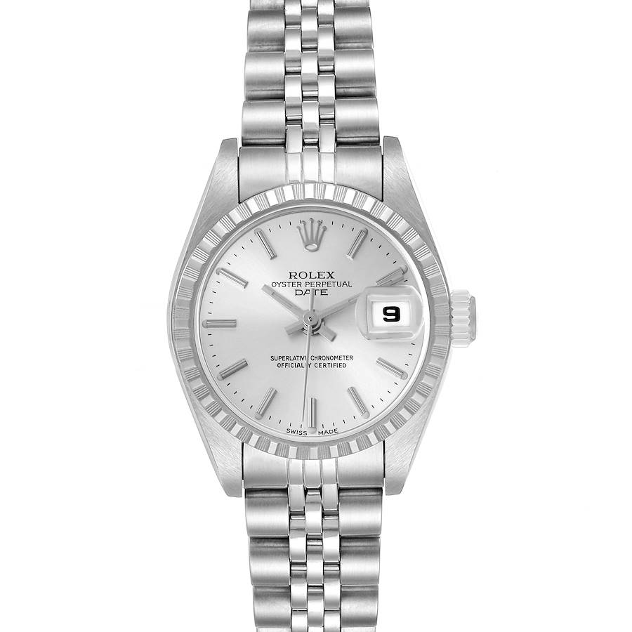 The Rolex Datejust watch is shown from a top-down angle displaying the dial, bracelet, and bezel.
