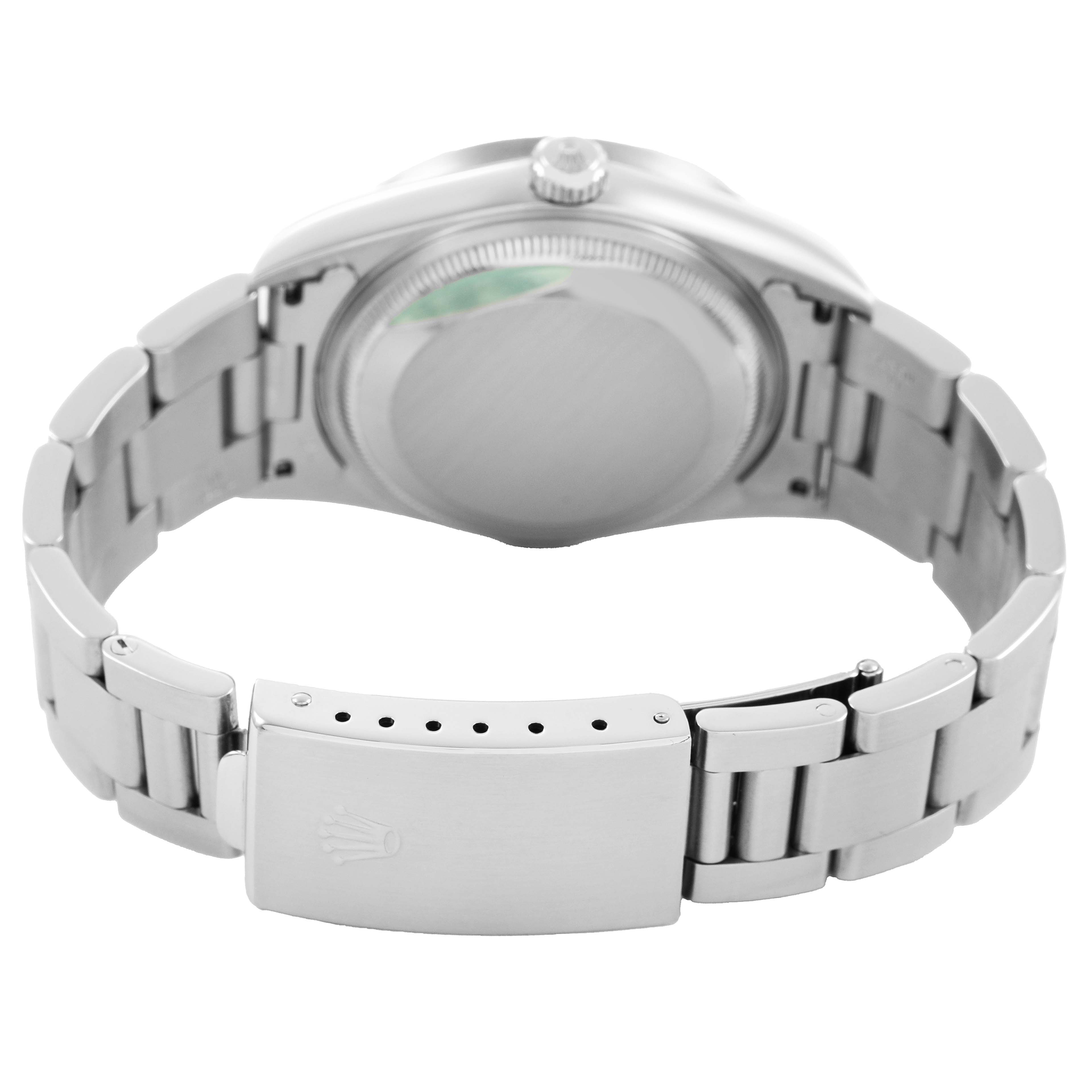 The image shows the back and clasp of a Rolex Date 15210 Men's Stainless Steel Black Dial model watch, highlighting the bracelet and crown logo on the clasp.