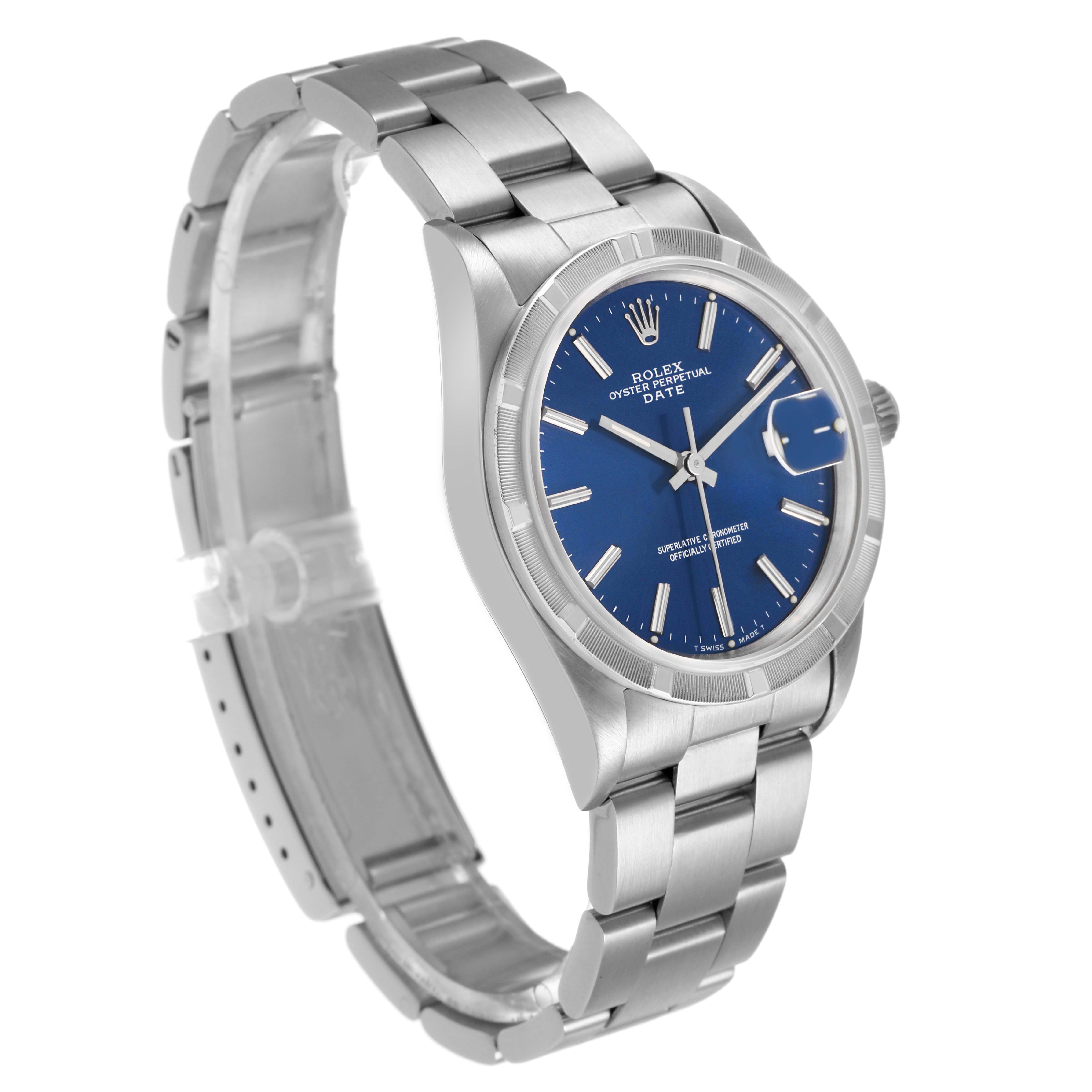 The Rolex Date 15210 Men's Stainless Steel Blue Dial watch is shown at a three-quarter angle, displaying its face, bracelet, crown, and clasp.