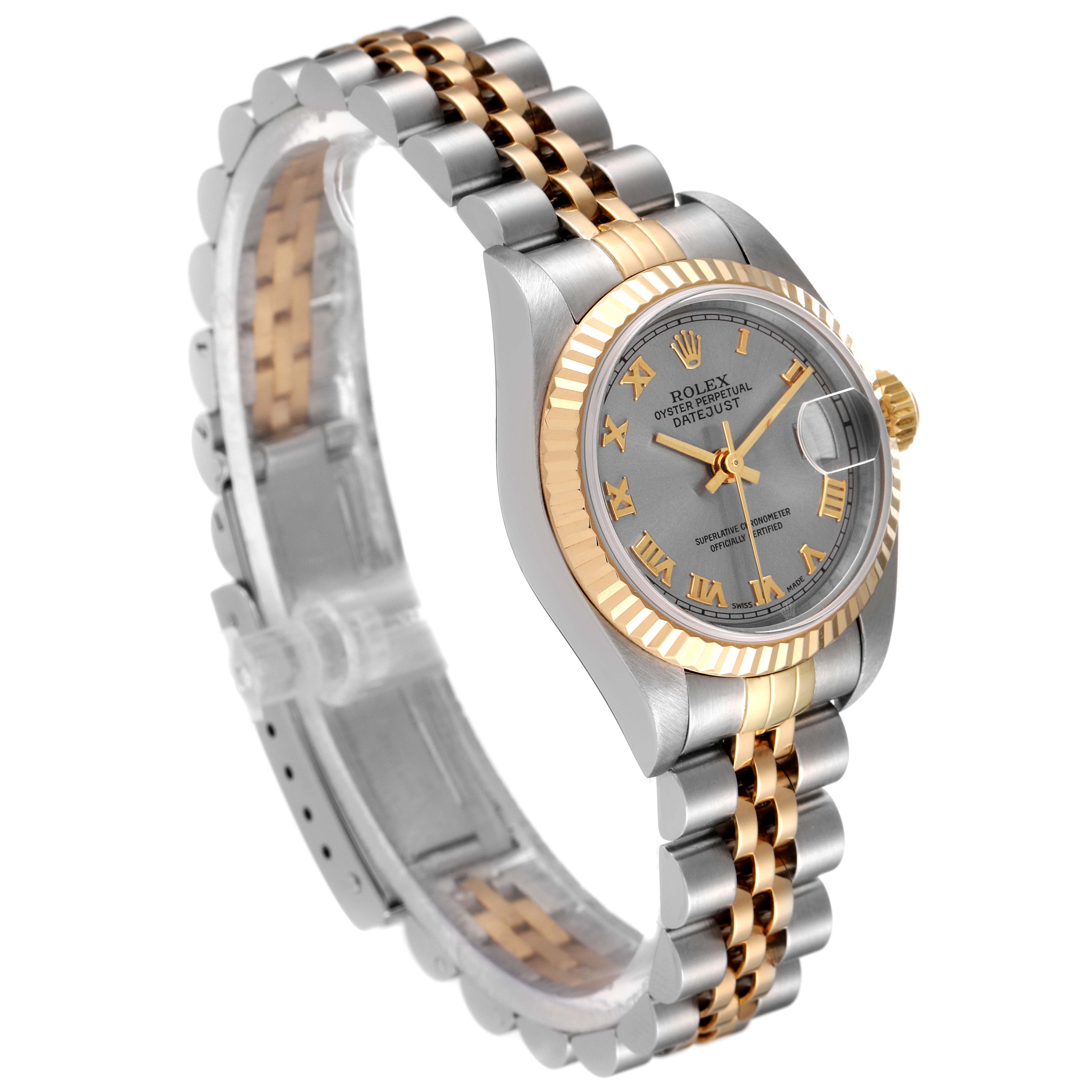 The image shows a side angle of a Rolex Datejust 79173 Women
s Steel and Gold (two tone) Grey Dial 79173 Women
s Steel and Gold (two tone) Grey Dial watch, featuring a two-tone Jubilee bracelet, fluted bezel, and grey dial with gold Roman numerals.
