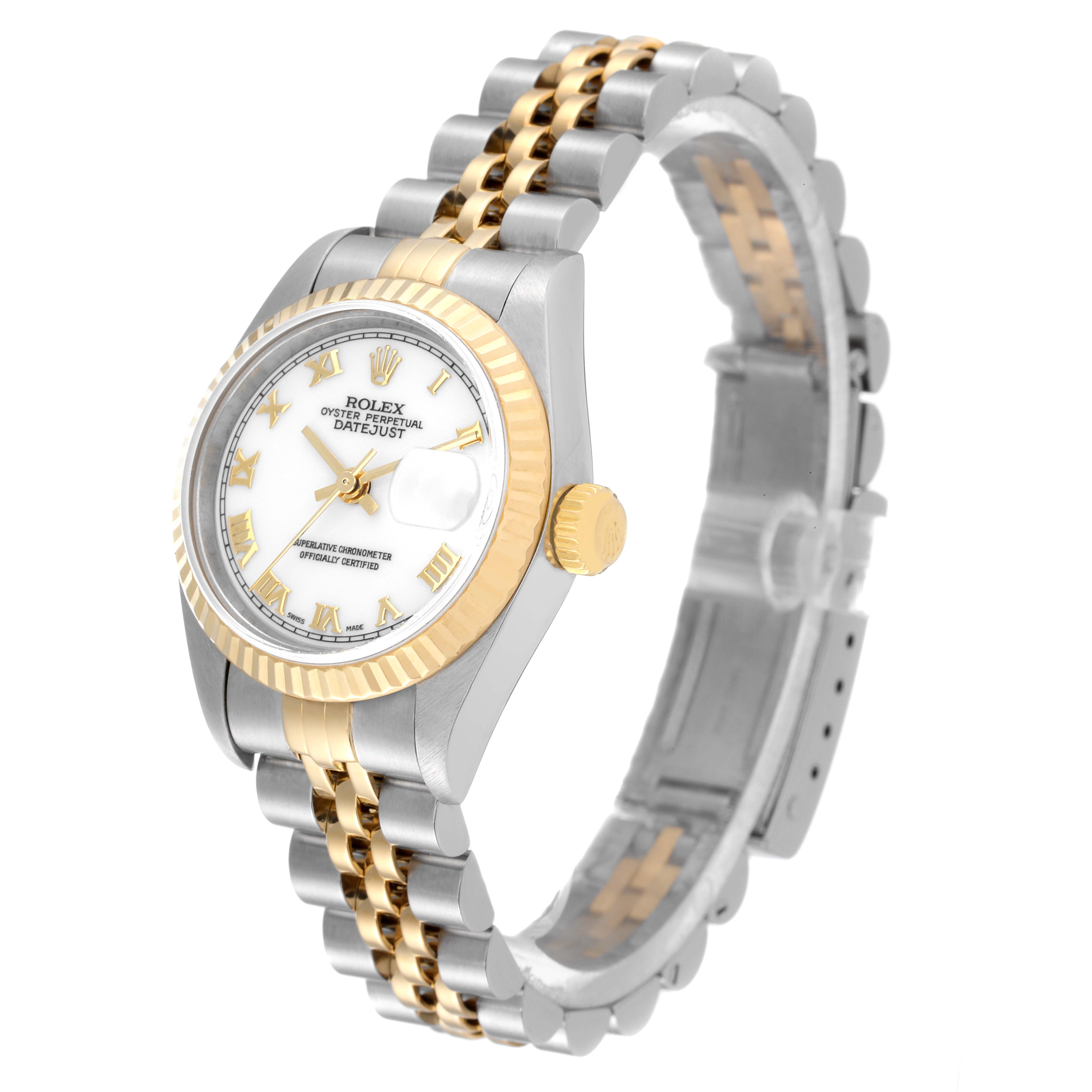 This image shows a Rolex Datejust 79173 Women
s Steel and Gold (two tone) White Dial 79173 Women
s Steel and Gold (two tone) White Dial watch at an angle displaying its face, crown, and two-tone bracelet.