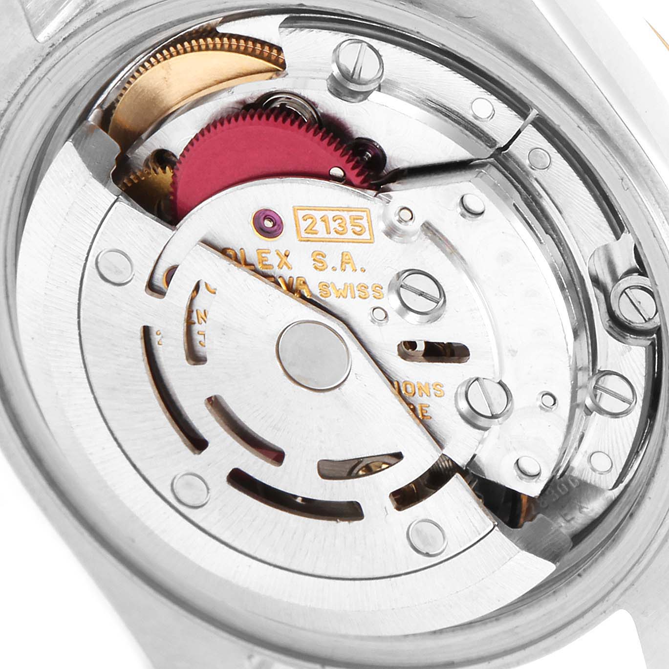 The image shows a close-up of the Rolex Datejust 69173 Women's Stainless Steel Champagne Dial 69173 Women's Stainless Steel Champagne Dial watch's 2135 movement from the back.