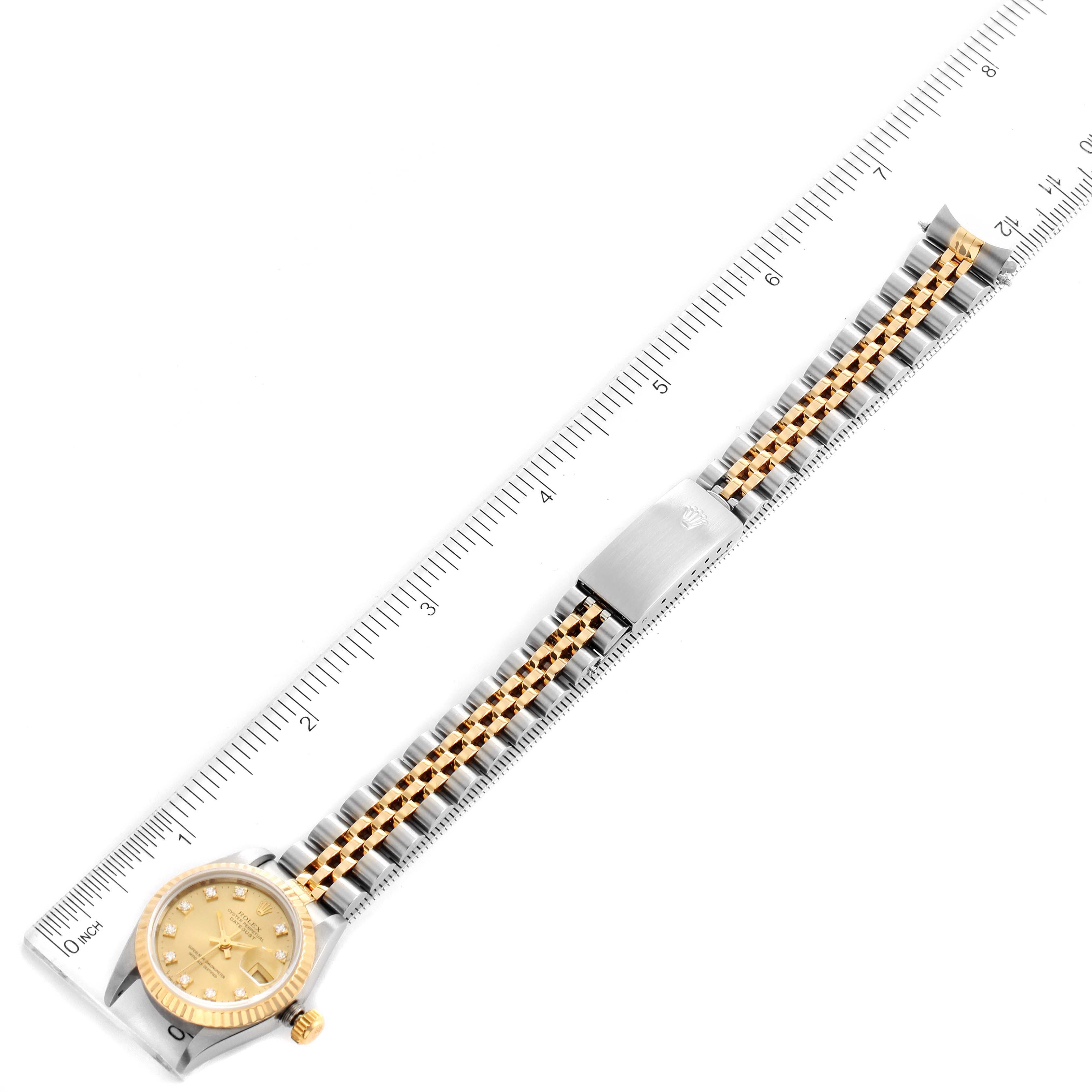 The image shows a Rolex Datejust 69173 Women's Stainless Steel Champagne Dial 69173 Women's Stainless Steel Champagne Dial watch fully extended, placed next to a ruler for measurement.