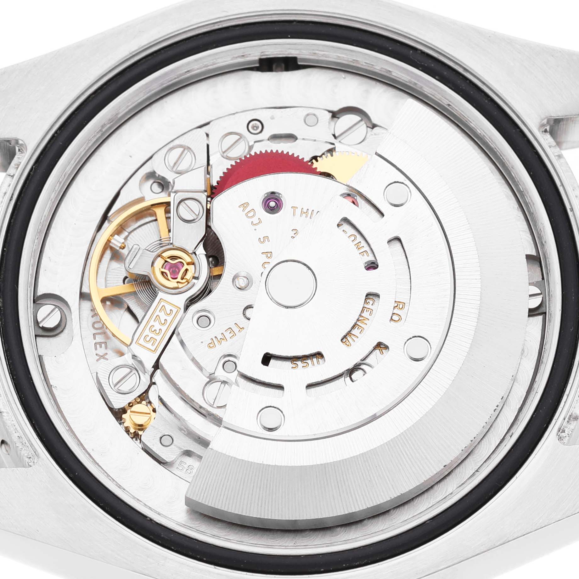 The image shows the backside view of the Rolex Mid-Size 178344 Women's Stainless Steel Black Dial watch, highlighting its movement mechanics and rotor.
