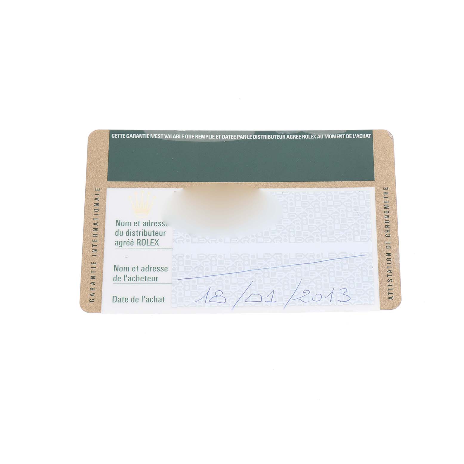 The image shows a warranty card for a Mid-Size Rolex watch, featuring text and a purchase date.