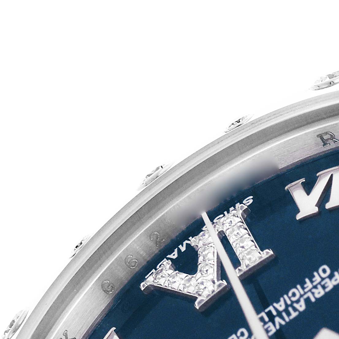 The image shows a close-up of a Rolex Mid-Size 178344 Women's Stainless Steel Black Dial watch face highlighting the bezel, a diamond-studded Roman numeral, and part of the dial.
