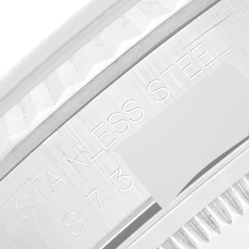 This image shows a close-up view of the stainless steel bezel and casing of a Rolex Datejust 16234 Men's Stainless Steel Pink Dial 16234 Men's Stainless Steel Pink Dial watch.