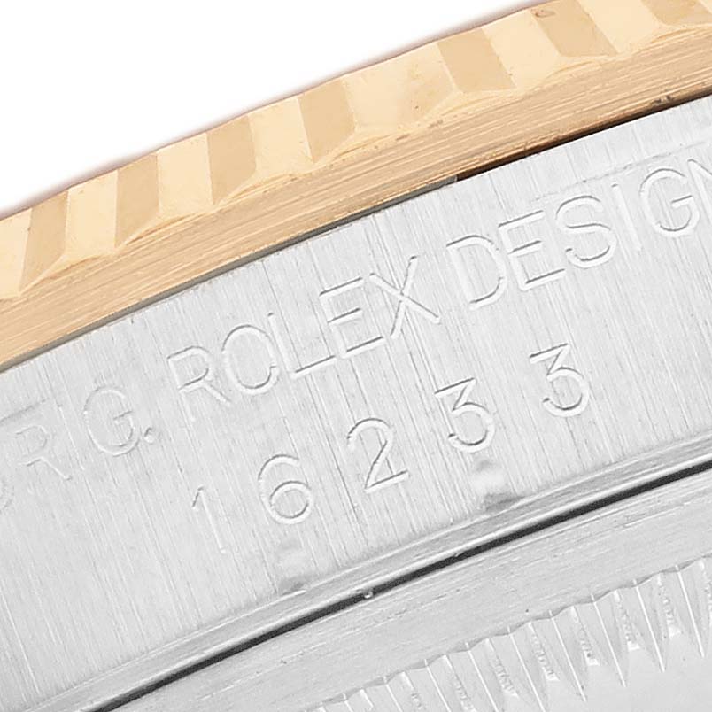 The image shows a close-up of the side of a Rolex Datejust 16233 Men's Steel and Gold (two tone) Champagne Dial, highlighting the engraved model details.