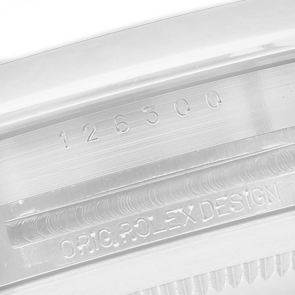 The image shows a close-up of the Rolex Datejust 41 126300 Men's Stainless Steel Grey Dial bezel with engravings for model and design identifiers.