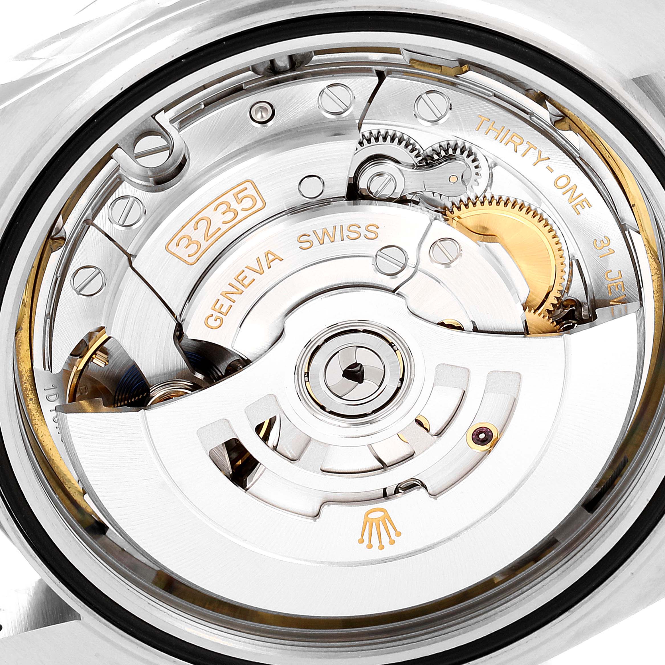 The image shows the movement mechanism of the Rolex Datejust 41 126300 Men
s Stainless Steel White Dial 126300 Men
s Stainless Steel White Dial watch, focusing on the rotor and intricate internal components.