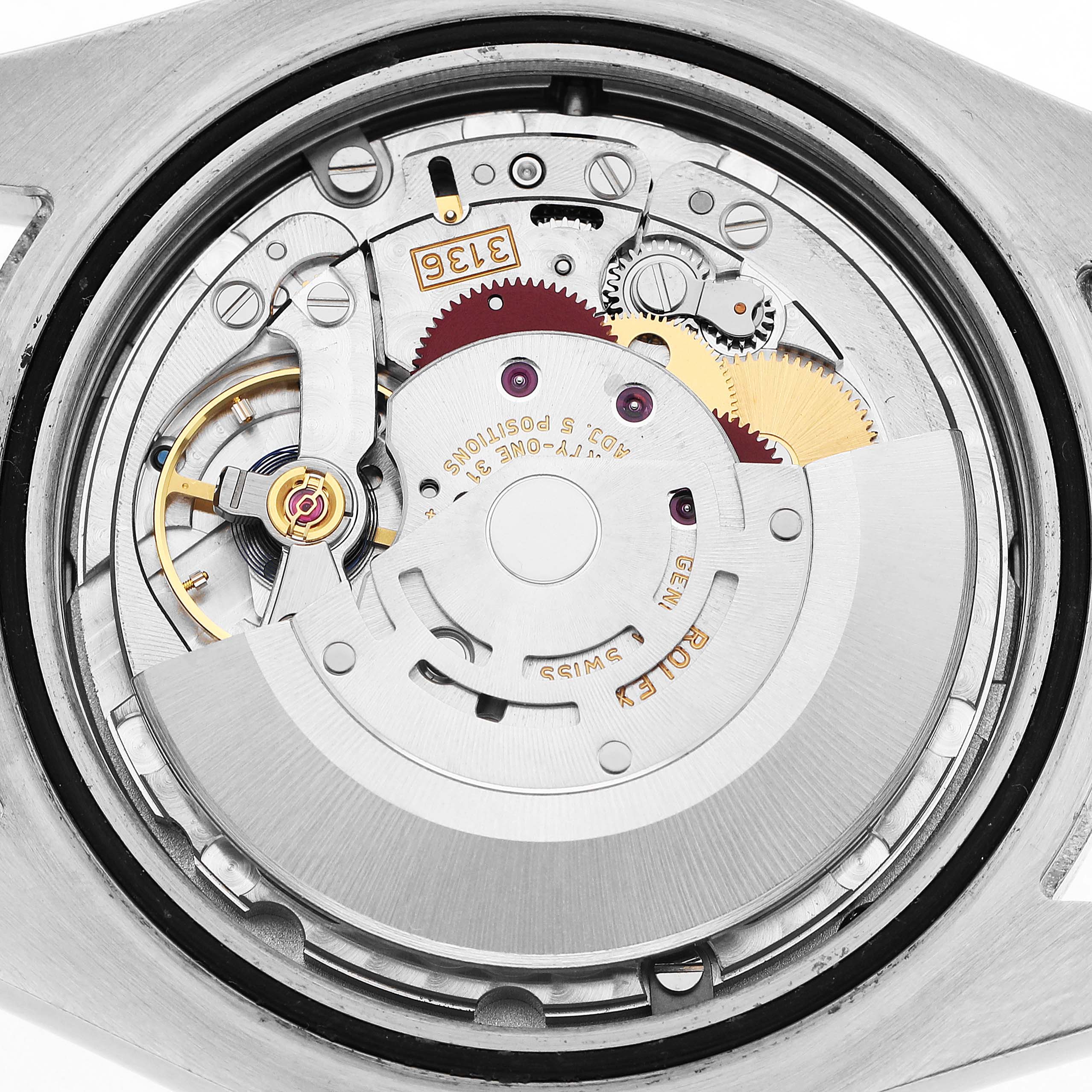 The image shows the Rolex Datejust 41 116300 Men's Stainless Steel Blue Dial's movement from a top-down angle, highlighting gears and the rotor mechanism.