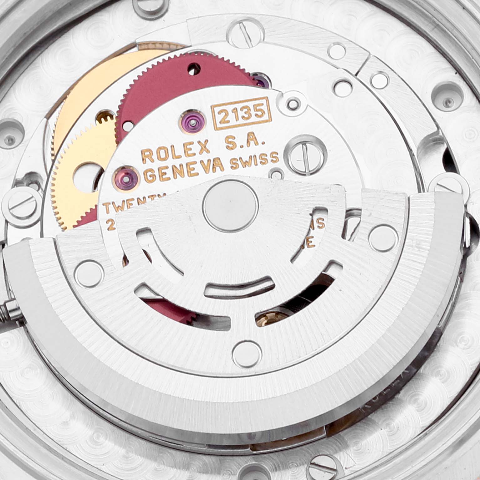 The image shows the intricate internal mechanics of a Rolex Mid-Size 68273 Women's Steel and Gold (two tone) Champagne Dial 68273 Women's Steel and Gold (two tone) Champagne Dial watch model 2135, viewed from a close-up angle.