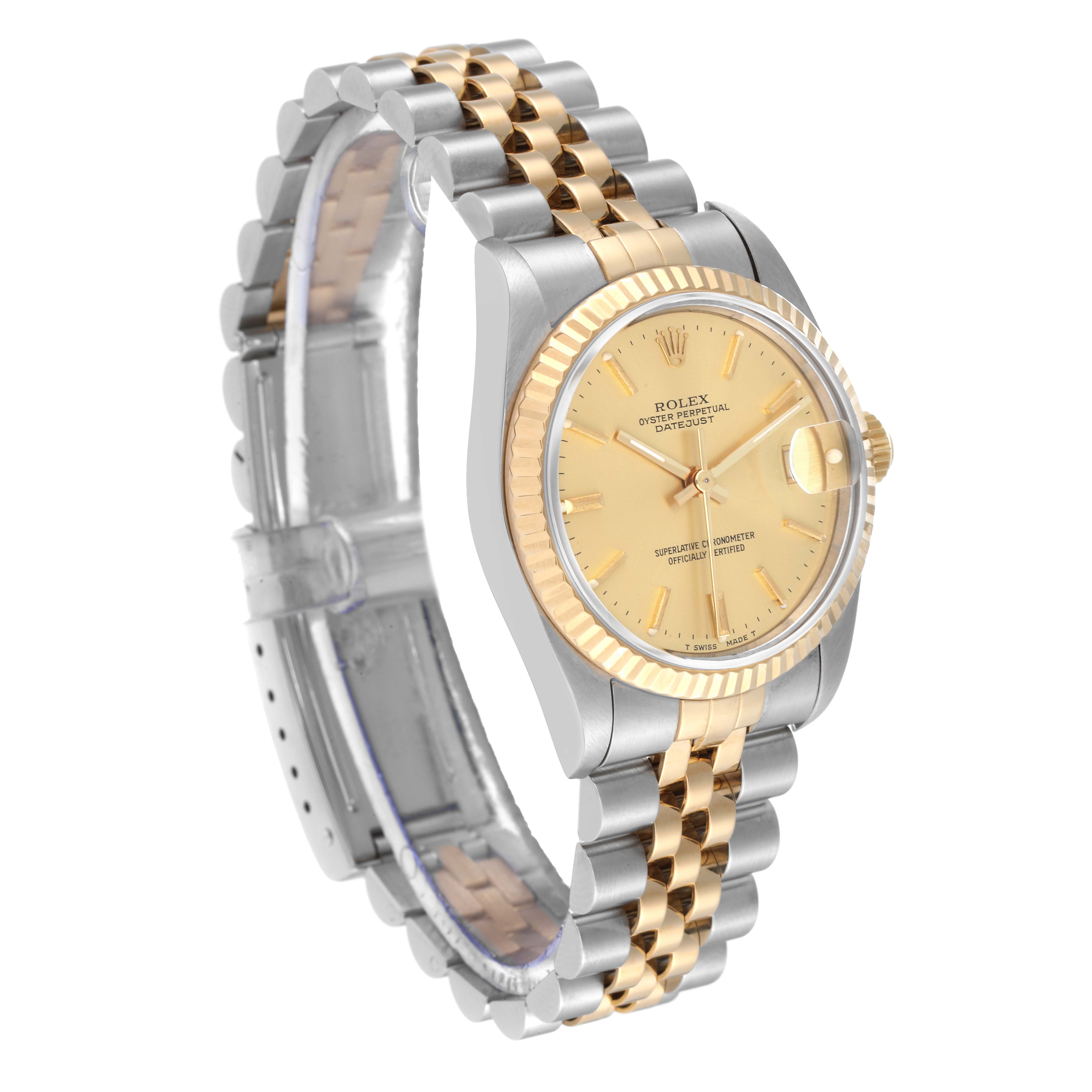 This image shows a side angle of a Rolex Mid-Size 68273 Women's Steel and Gold (two tone) Champagne Dial 68273 Women's Steel and Gold (two tone) Champagne Dial Datejust watch, focusing on the dial, bezel, and bracelet.