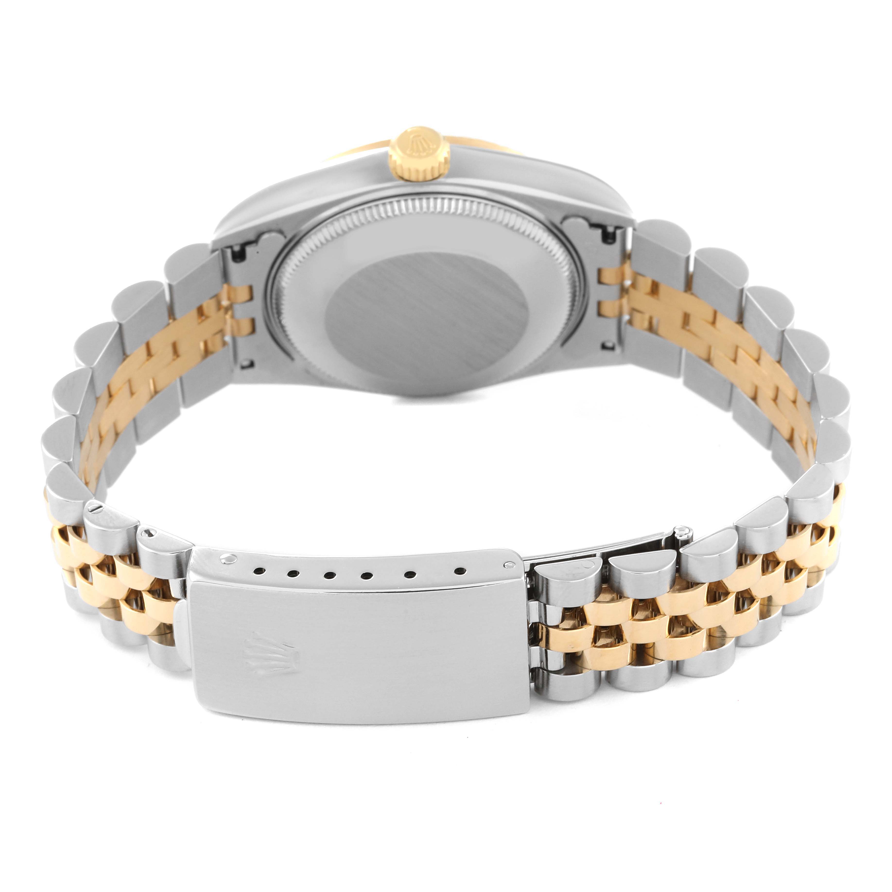 This image shows the back and clasp of a Rolex Mid-Size 68273 Women's Steel and Gold (two tone) Champagne Dial 68273 Women's Steel and Gold (two tone) Champagne Dial watch, emphasizing its two-tone bracelet and case back.